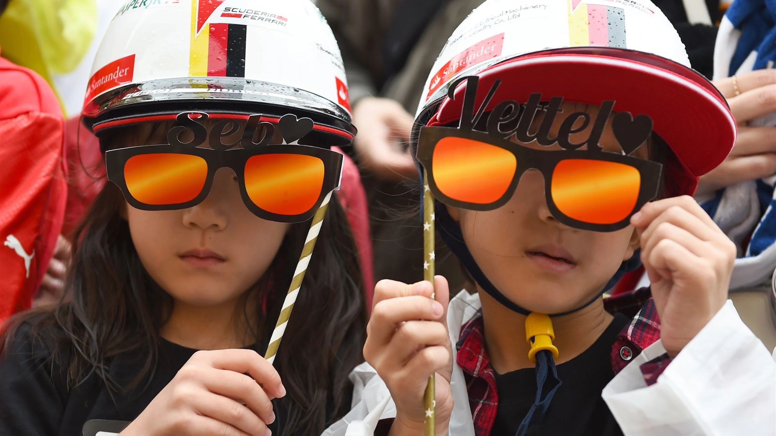 Sebastian Vettel (GER) Ferrari fans at Formula One World Championship, Rd14, Japanese Grand Prix,