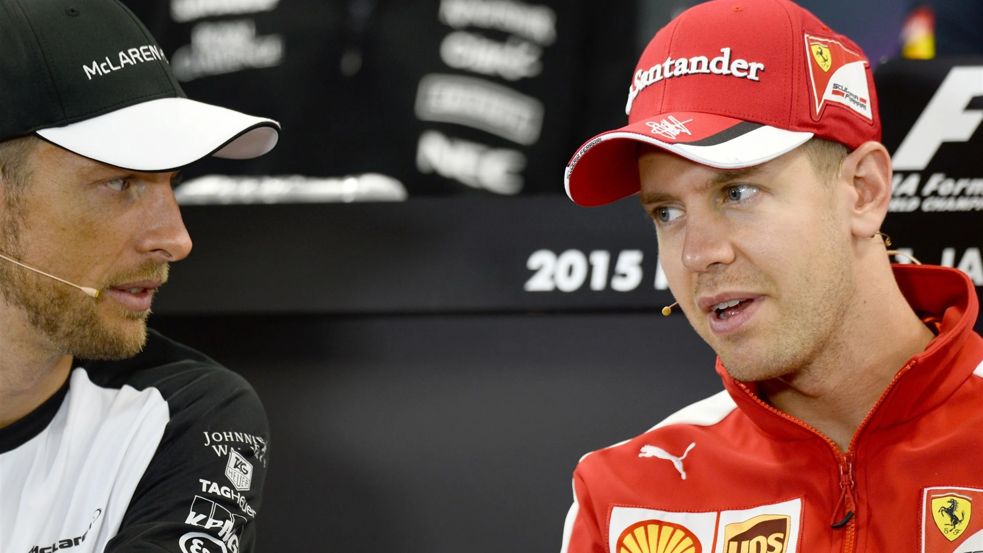 Jenson Button (GBR) McLaren and Sebastian Vettel (GER) Ferrari in the press conference at Formula