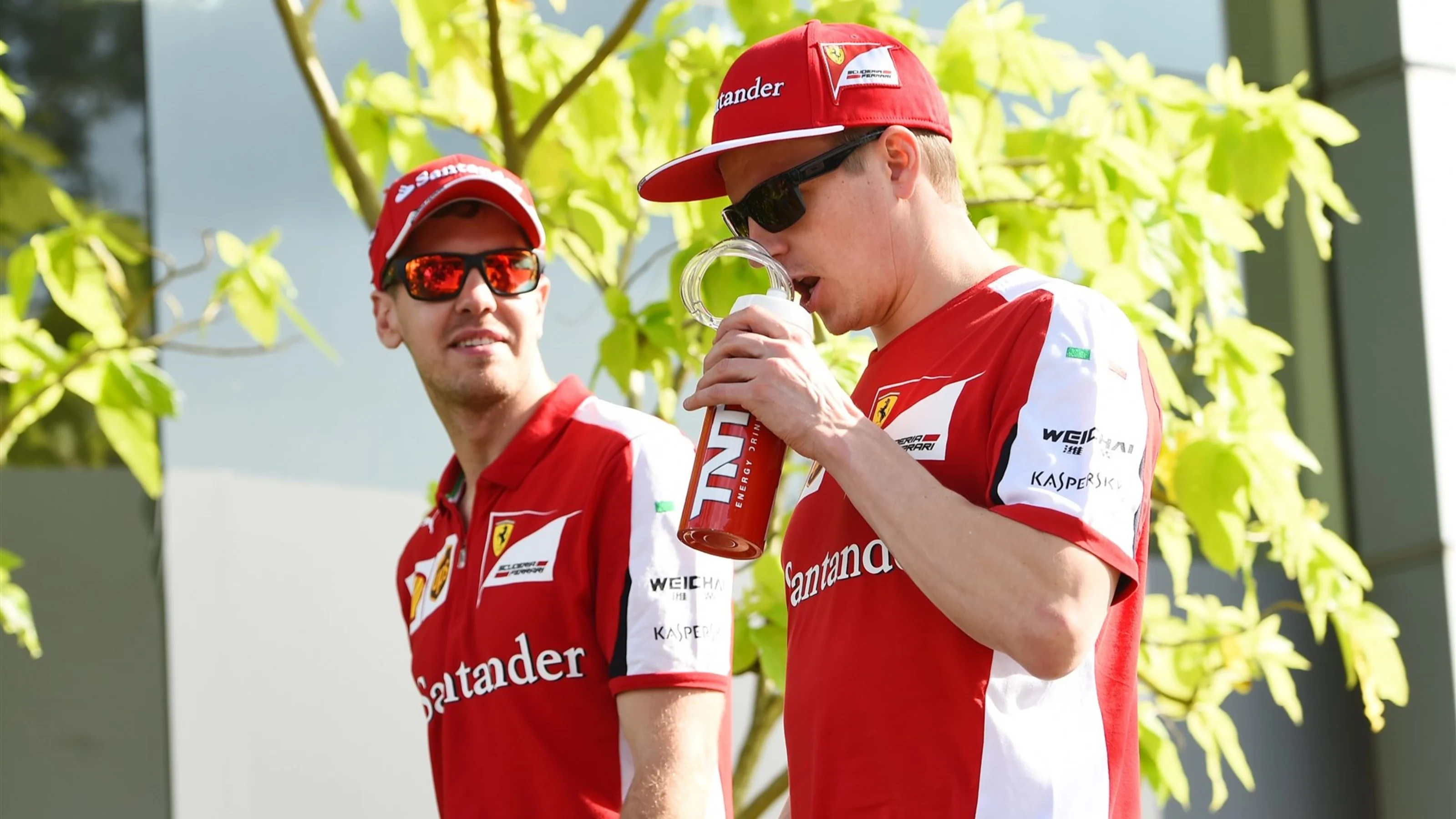 Sebastian Vettel (GER) Ferrari and Kimi Raikkonen (FIN) Ferrari at Formula One World Championship,