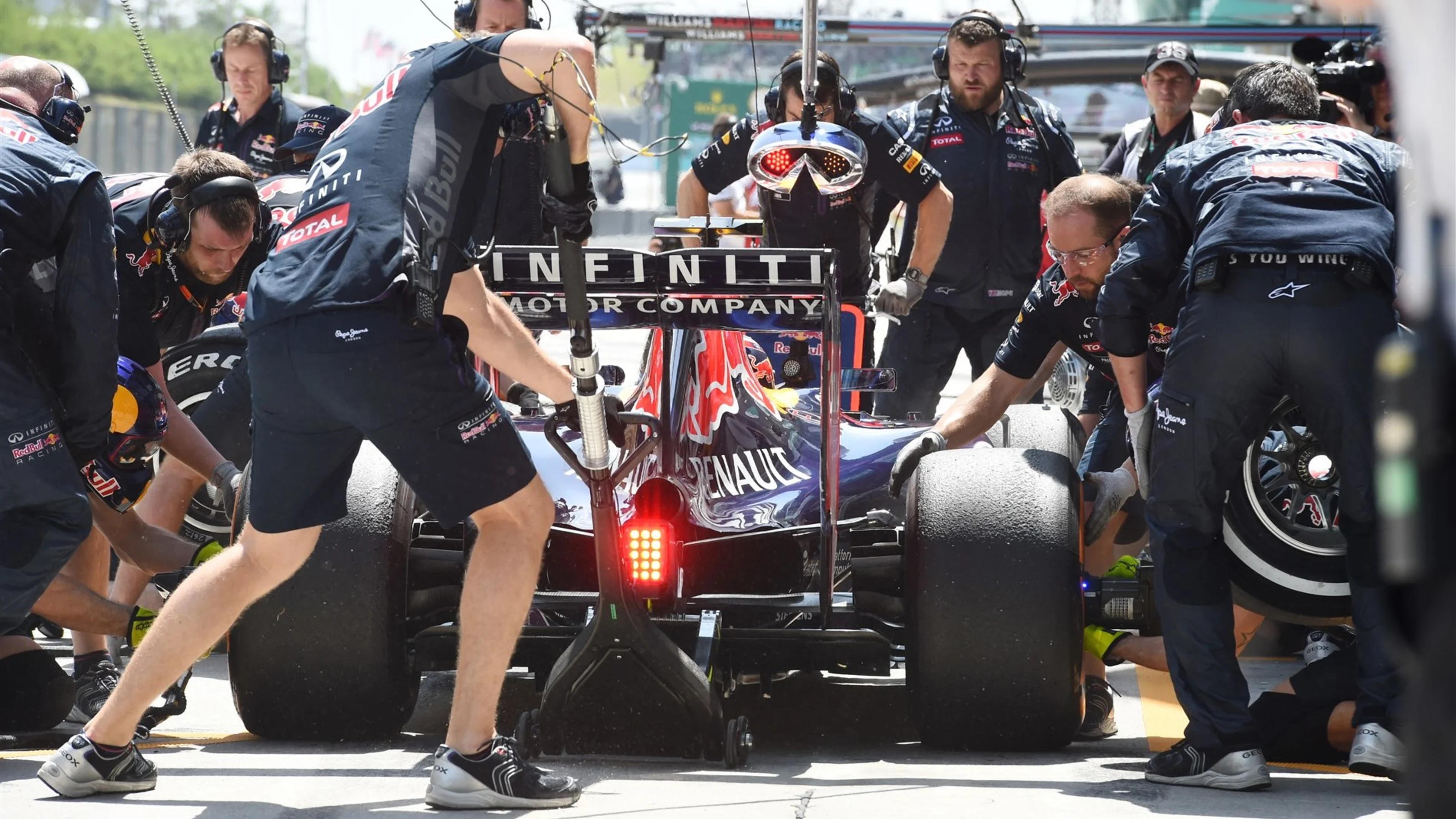 Daniil Kvyat (RUS) Red Bull Racing RB11 makes a pit stop at Formula One World Championship, Rd2,