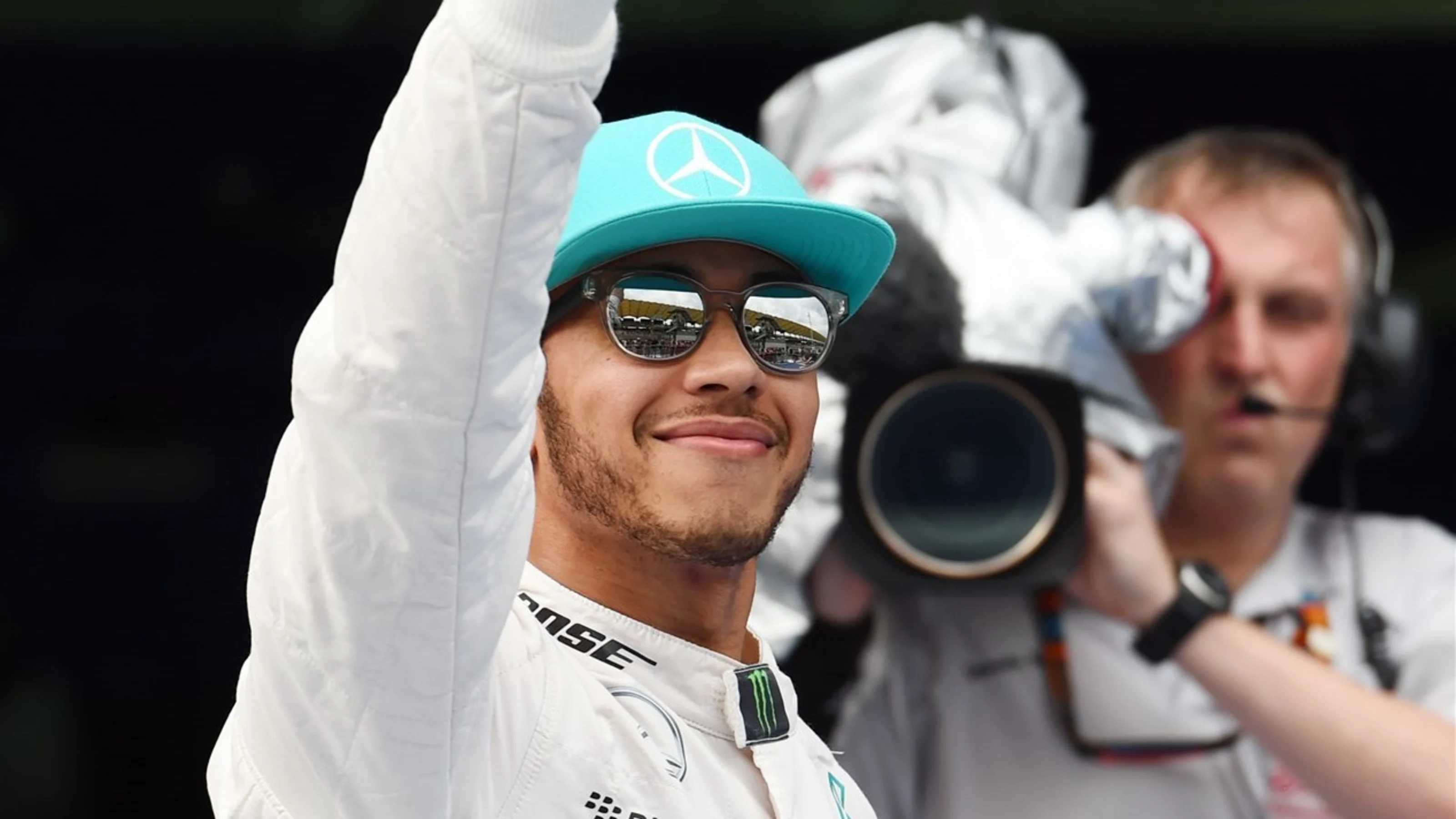 Pole sitter Lewis Hamilton (GBR) Mercedes AMG F1 celebrates in parc ferme at Formula One World