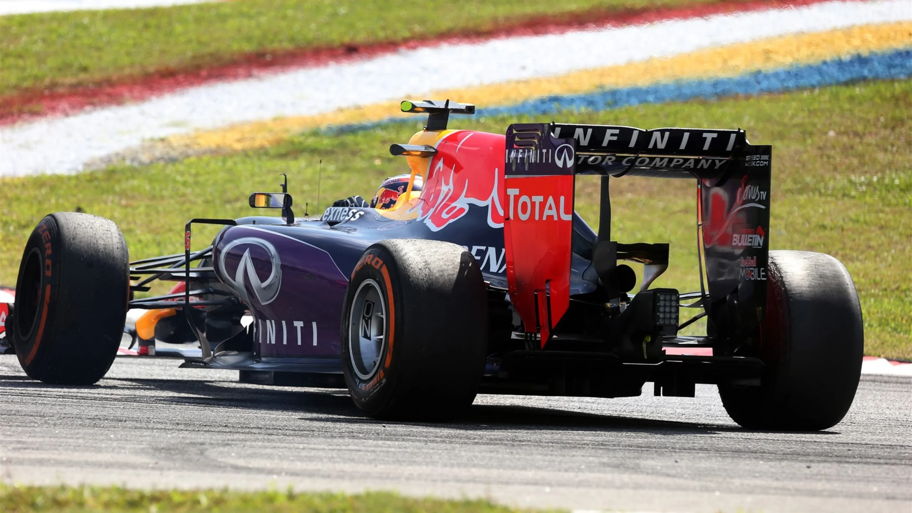Daniil Kvyat (RUS) Red Bull Racing RB11 spins after contact with Nico Hulkenberg (GER) Force India