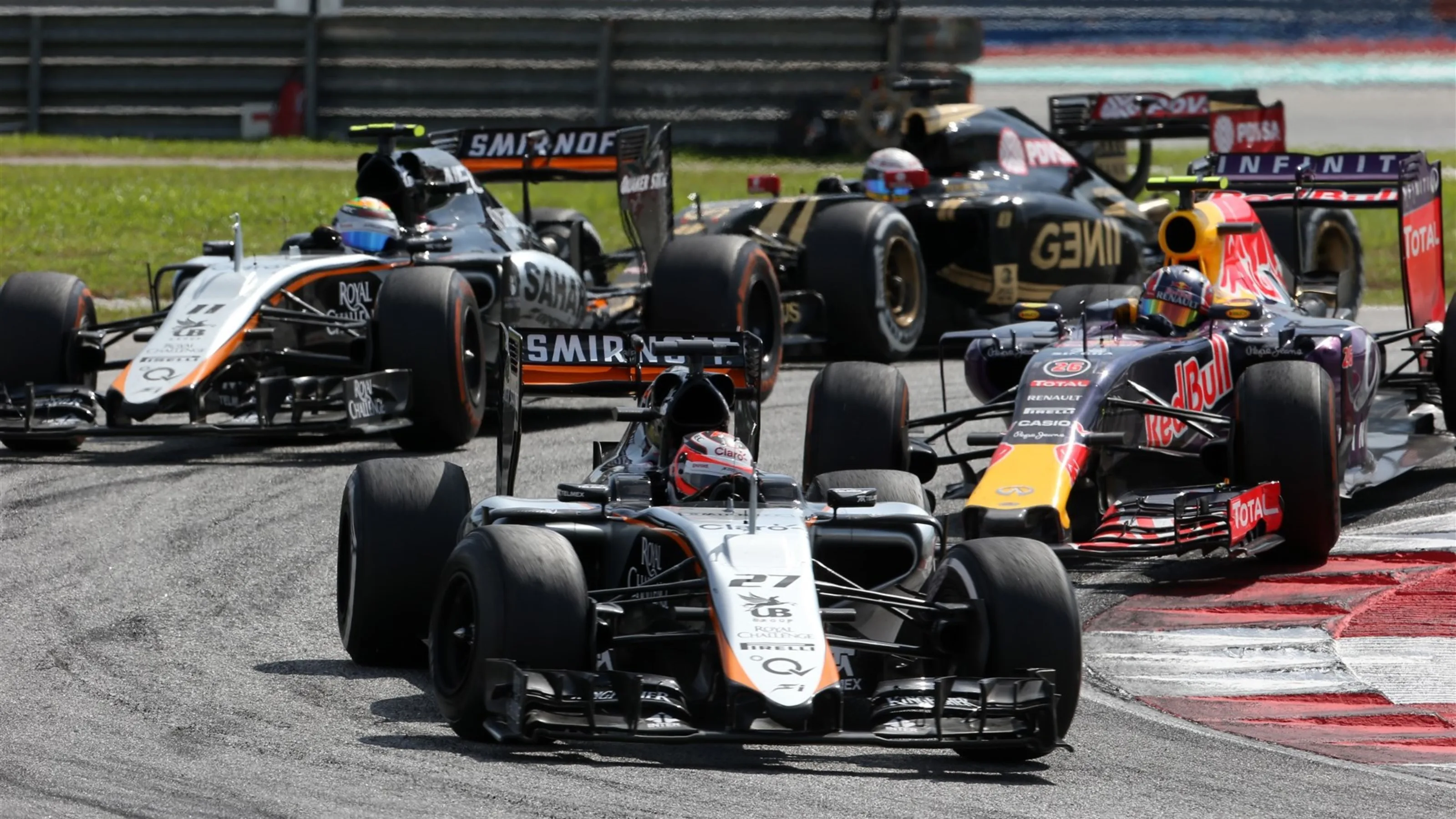 Nico Hulkenberg (GER) Force India VJM08 leads Daniil Kvyat (RUS) Red Bull Racing RB11 at Formula