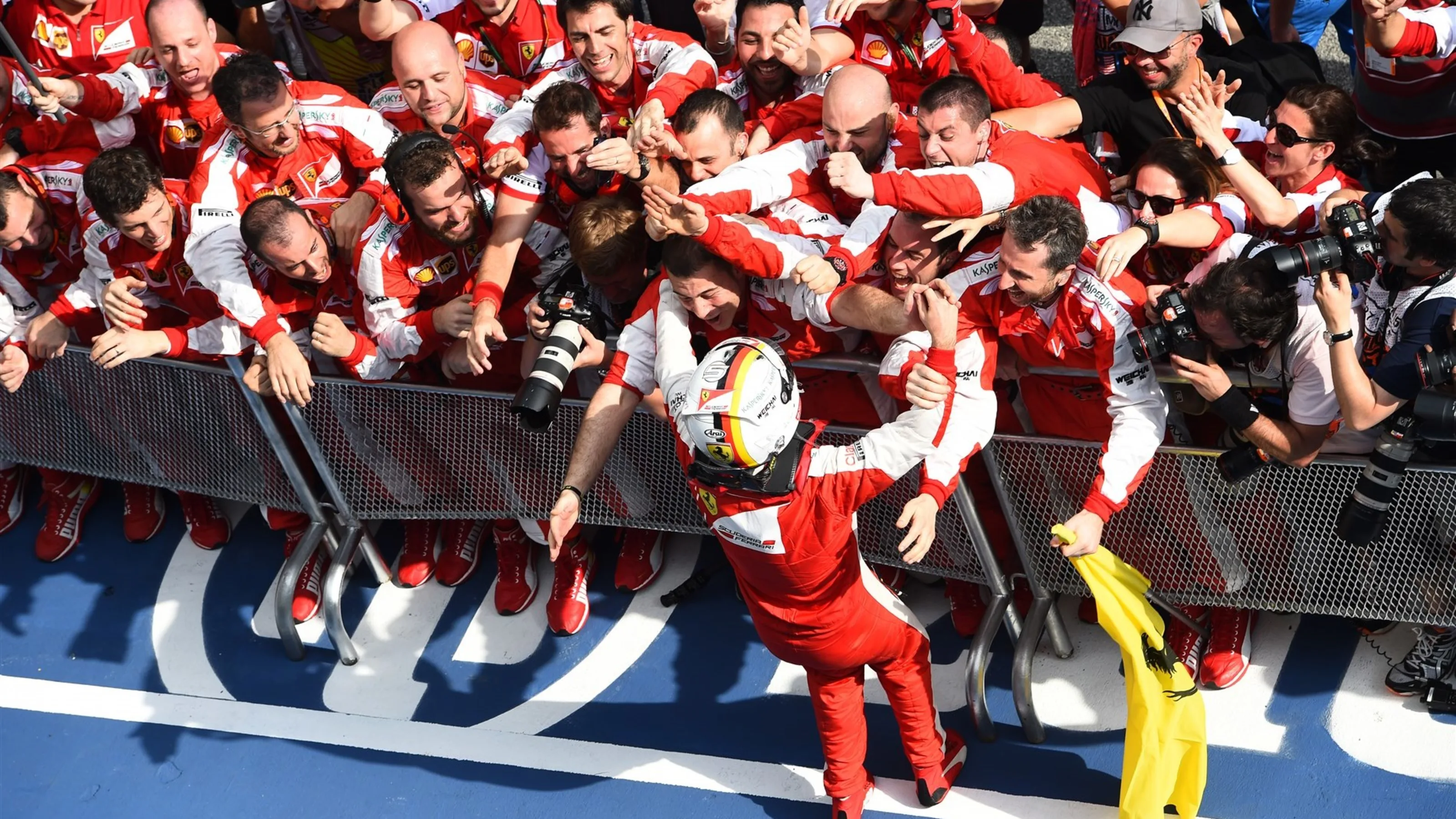 Sebastian Vettel (GER) Ferrari celebrates victory in Parc Ferme at Formula One World Championship,