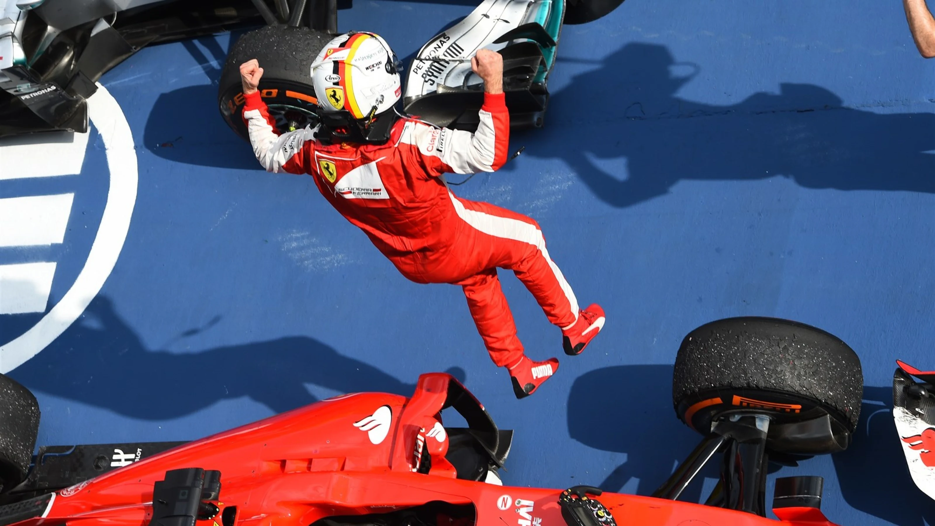 Sebastian Vettel (GER) Ferrari celebrates victory in Parc Ferme at Formula One World Championship,