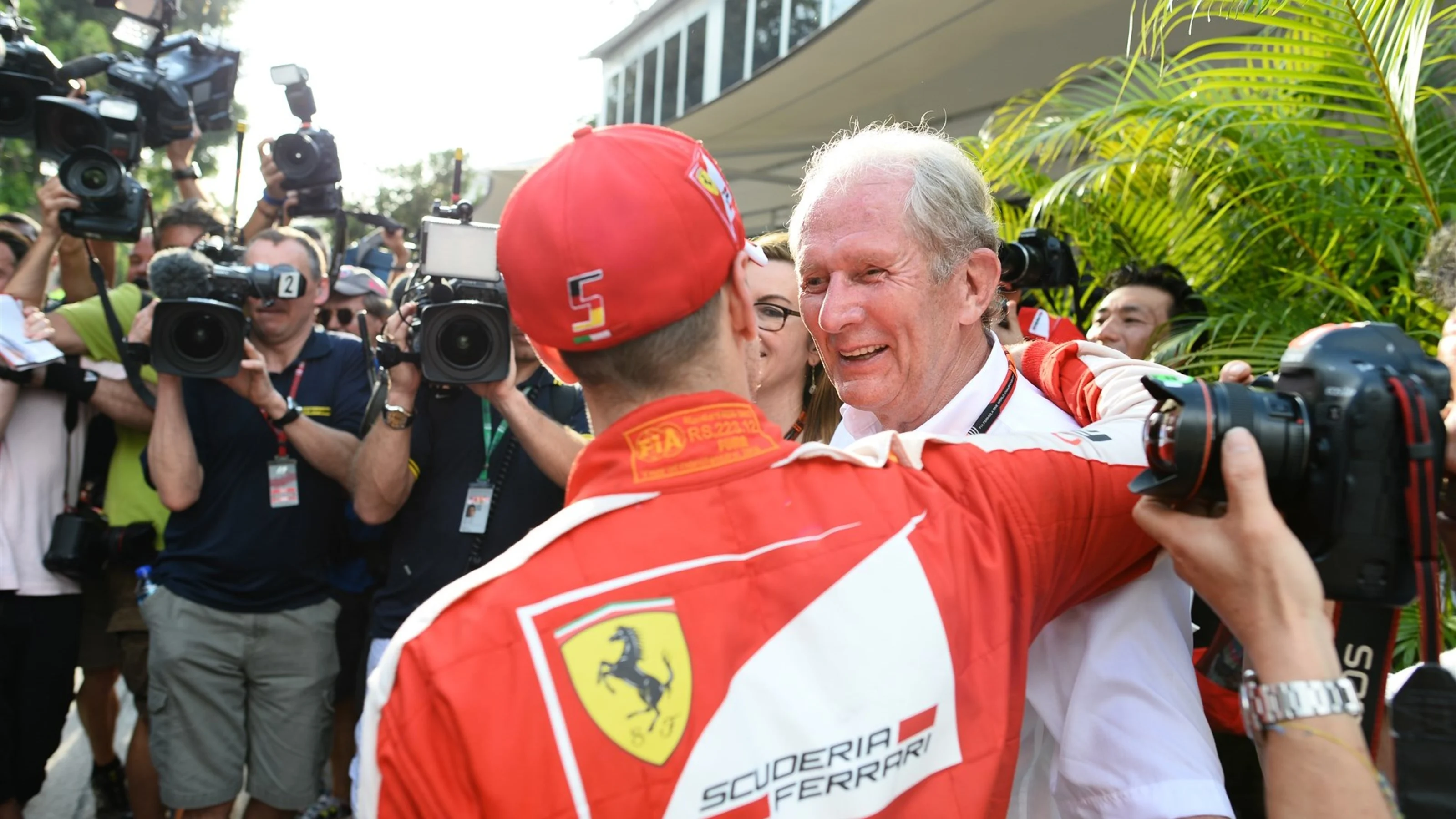 Sebastian Vettel (GER) Ferrari and Dr Helmut Marko (AUT) Red Bull Motorsport Consultant at Formula