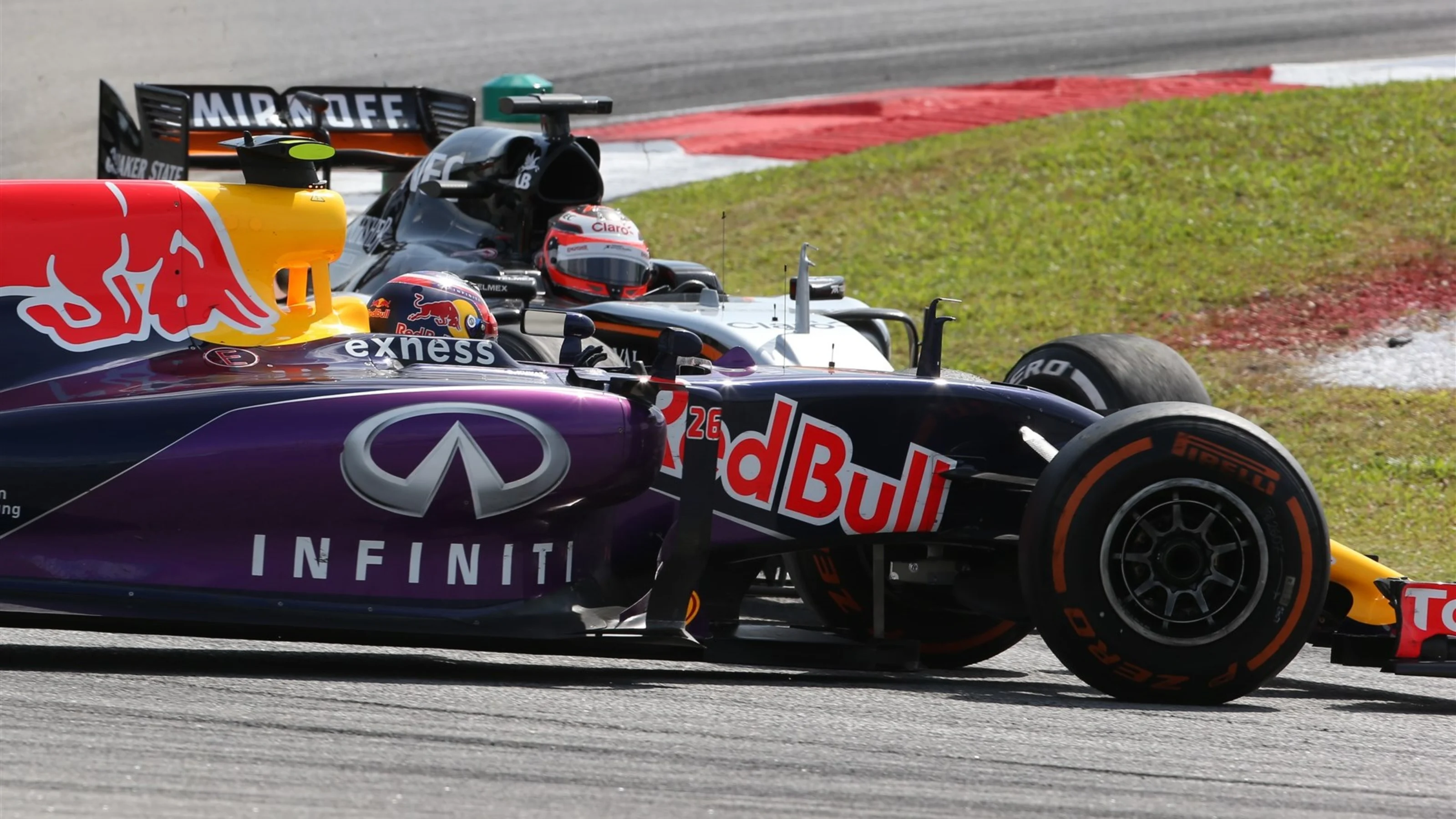 Daniil Kvyat (RUS) Red Bull Racing RB11 and Nico Hulkenberg (GER) Force India VJM08 collide at