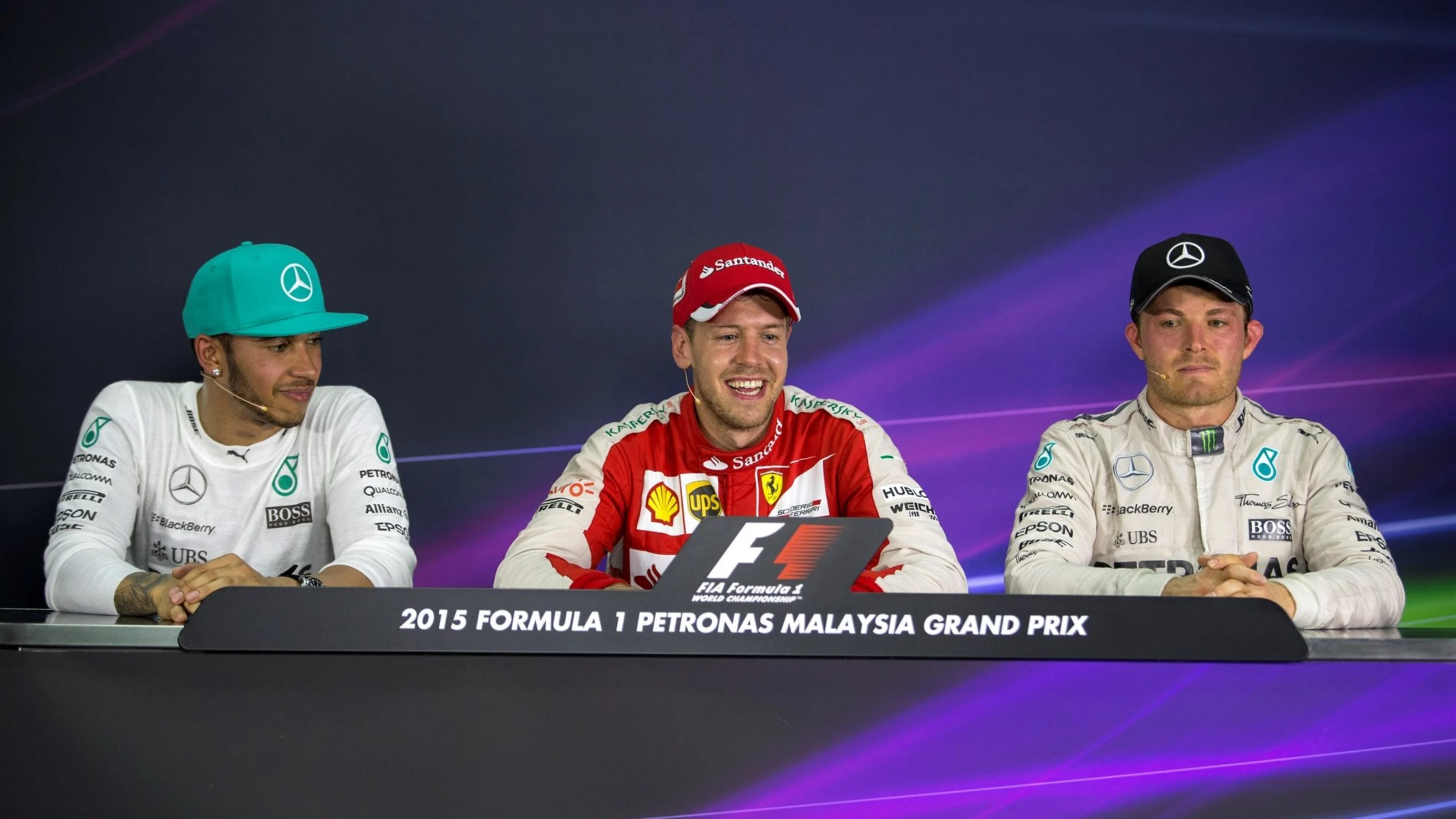 (L to R): Lewis Hamilton (GBR) Mercedes AMG F1, Sebastian Vettel (GER) Ferrari and Nico Rosberg