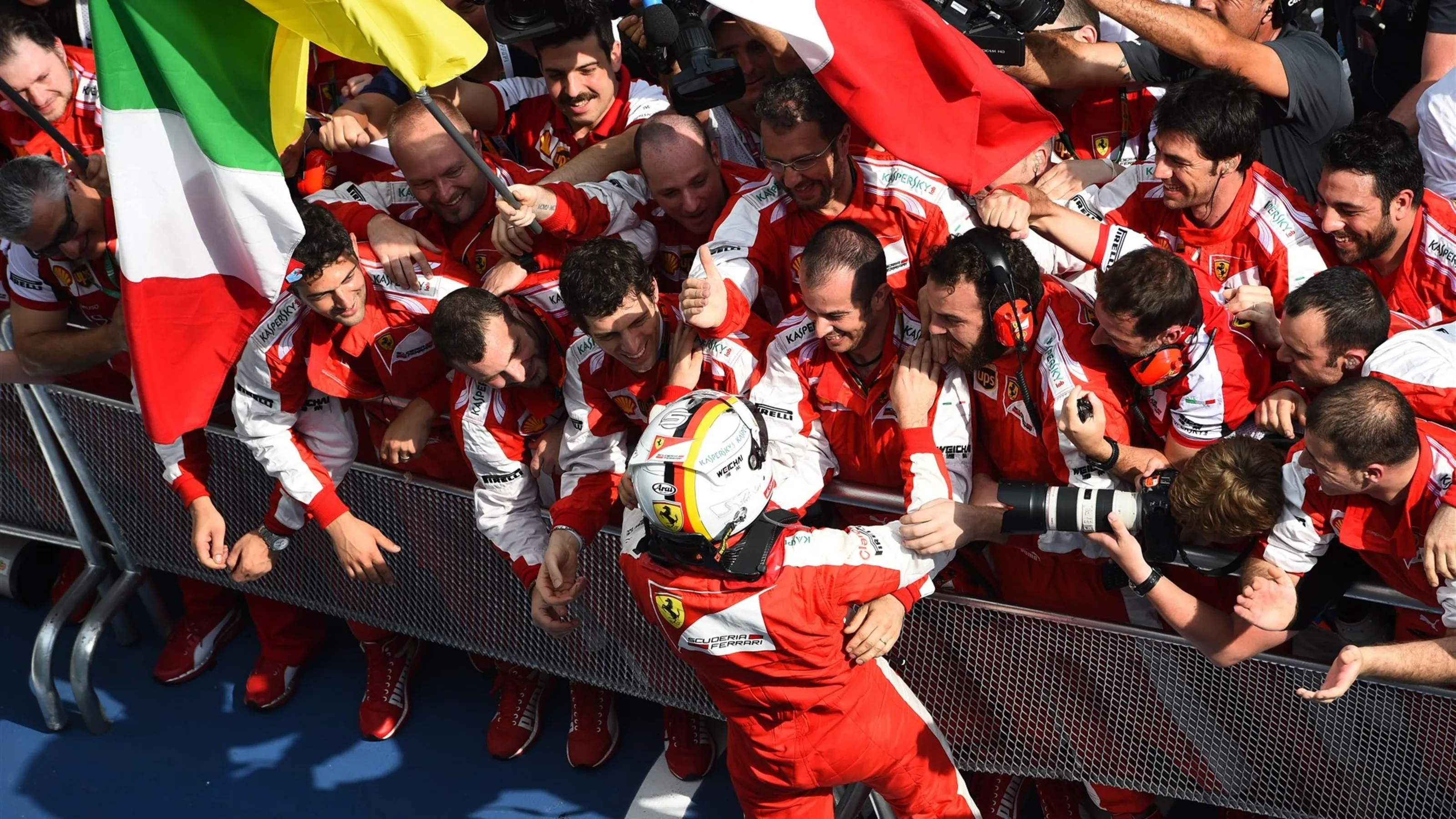 Sebastian Vettel (GER) Ferrari celebrates victory in Parc Ferme at Formula One World Championship,