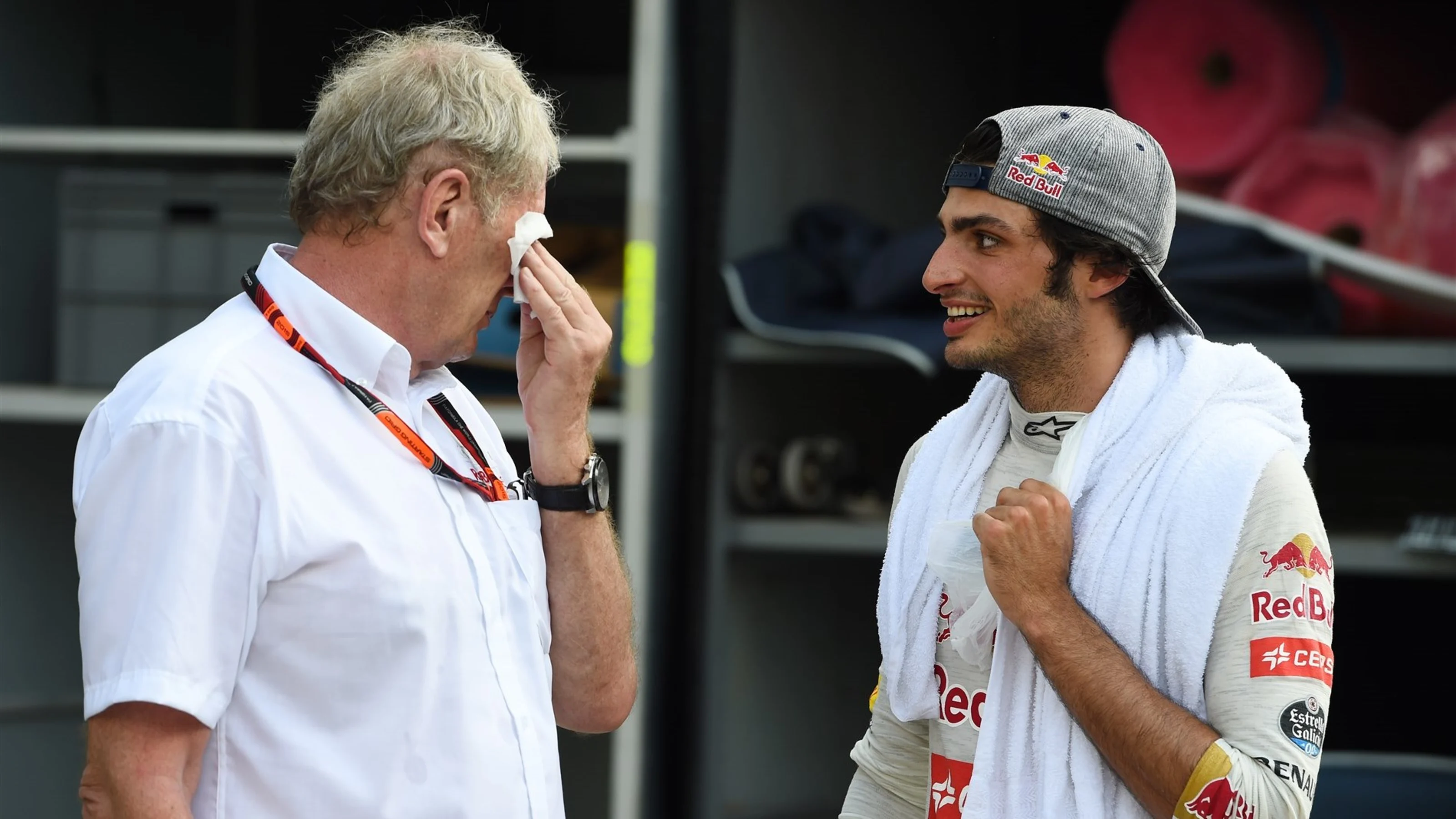 Dr Helmut Marko (AUT) Red Bull Motorsport Consultant and Carlos Sainz jr (ESP) Scuderia Toro Rosso