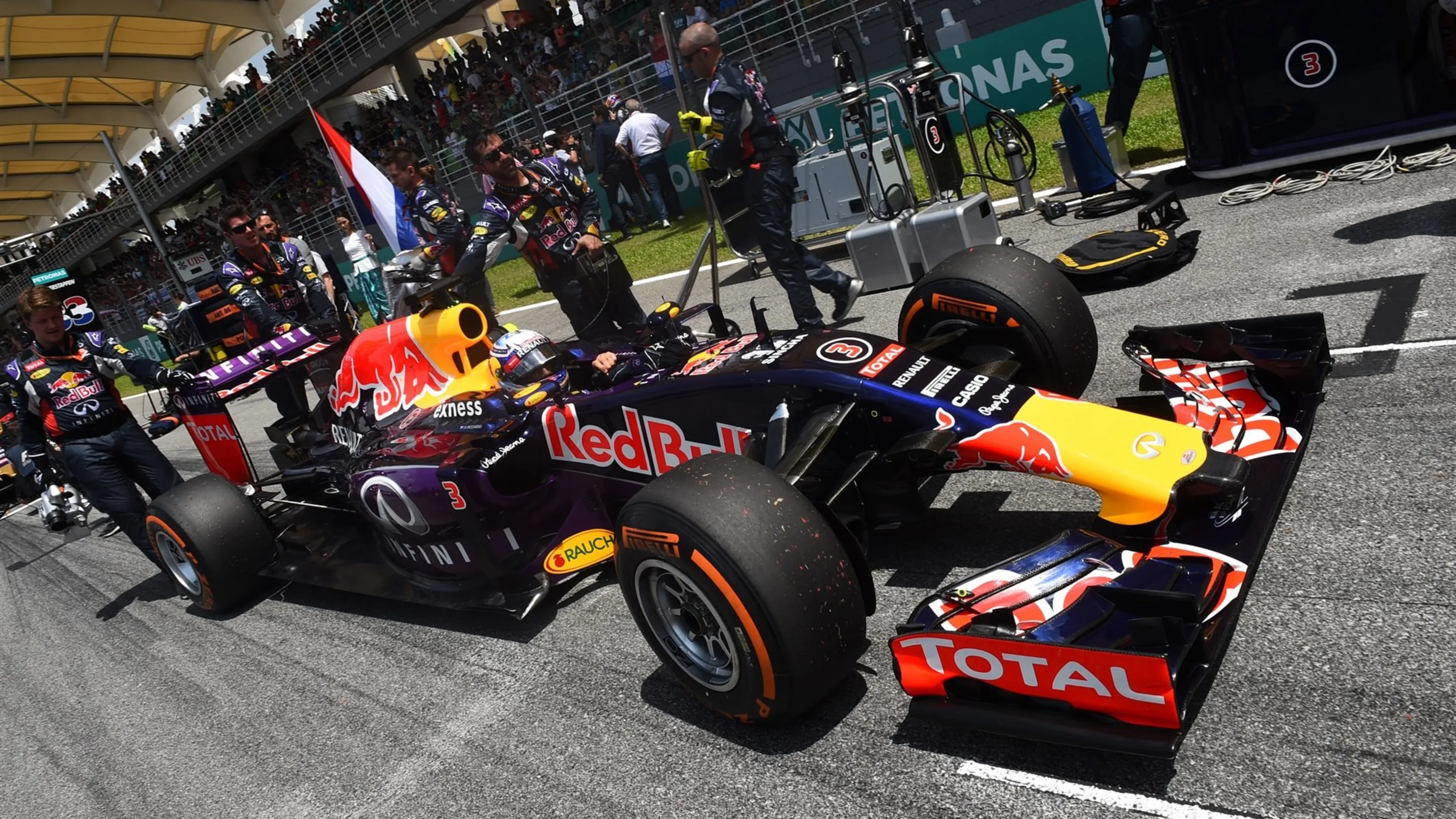 Daniel Ricciardo (AUS) Red Bull Racing RB11 on the grid at Formula One World Championship, Rd2,