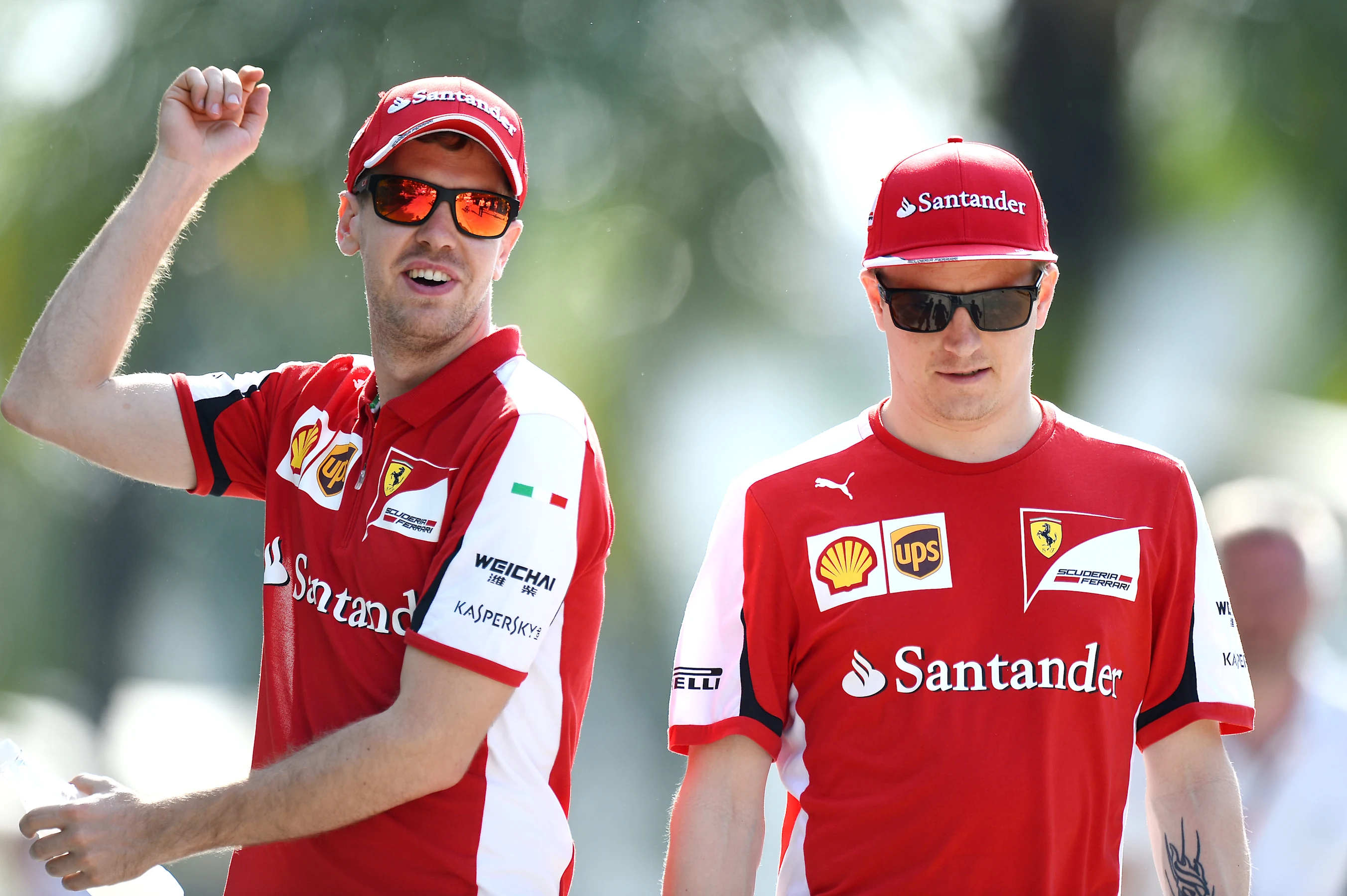 Sebastian Vettel (GER) Ferrari and Kimi Raikkonen (FIN) Ferrari at Formula One World Championship,