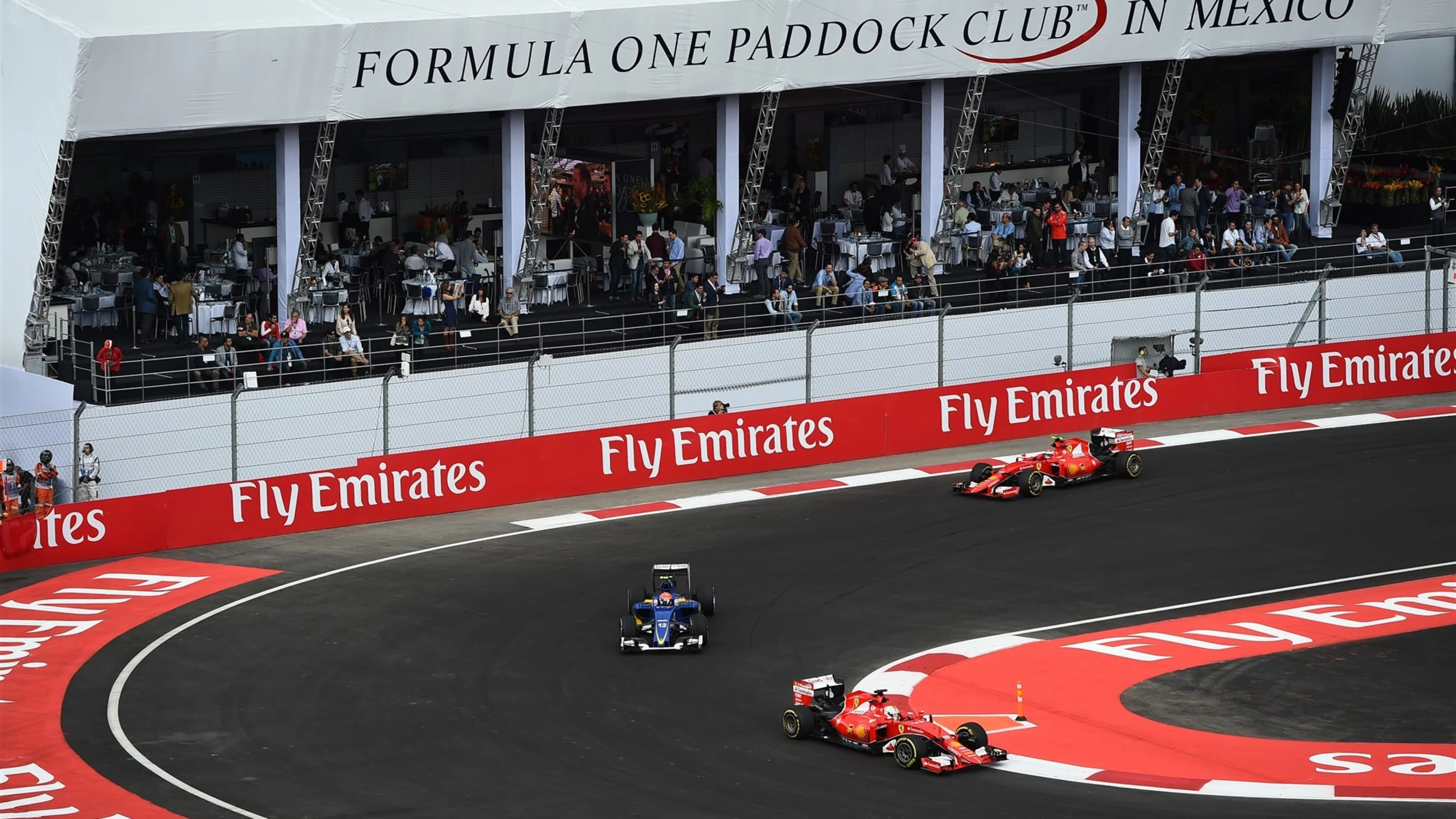 Sebastian Vettel (GER) Ferrari SF15-T, Felipe Nasr (BRA) Sauber C34 and Kimi Raikkonen (FIN)