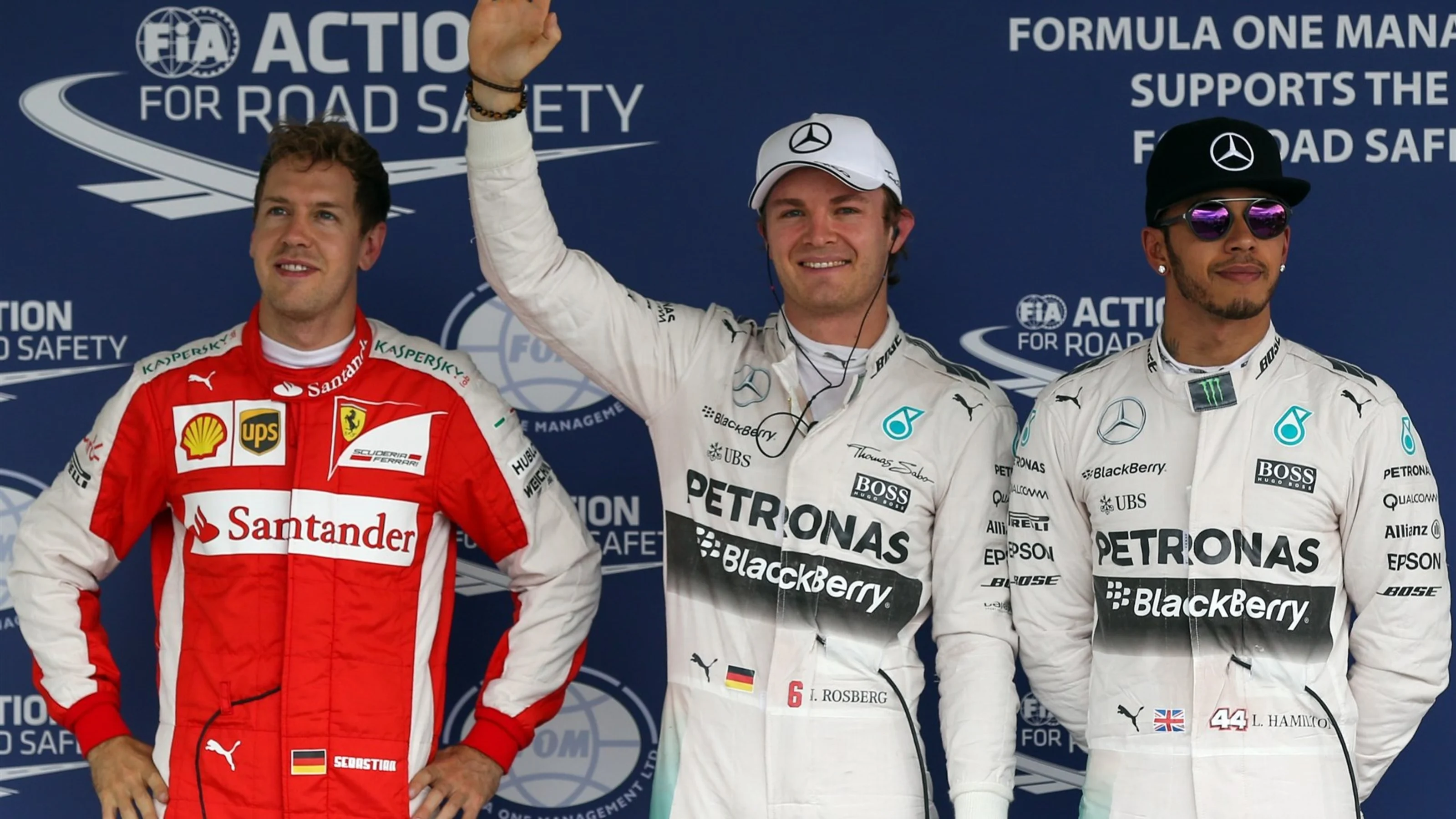 (L to R): Sebastian Vettel (GER) Ferrari, pole sitter Nico Rosberg (GER) Mercedes AMG F1 and Lewis