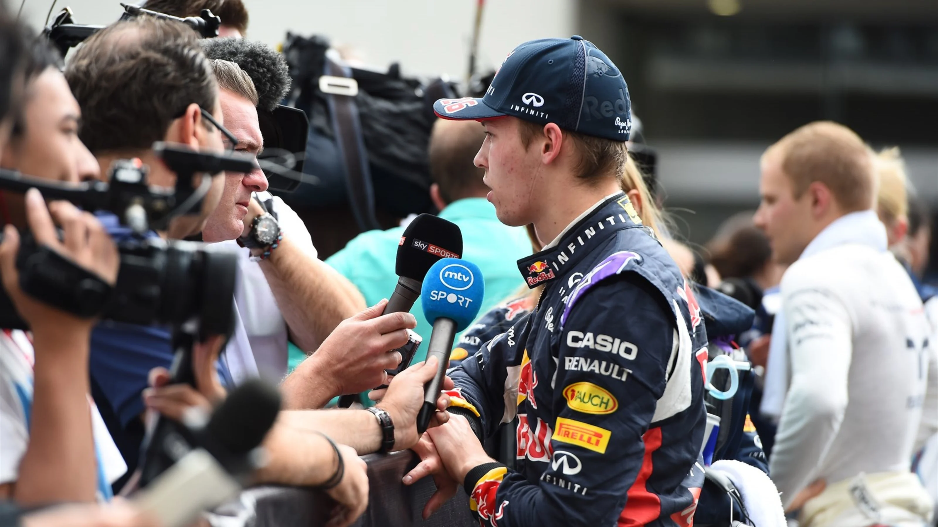 Daniil Kyvat (RUS) Red Bull Racing talks to the press at Formula One World Championship, Rd17,