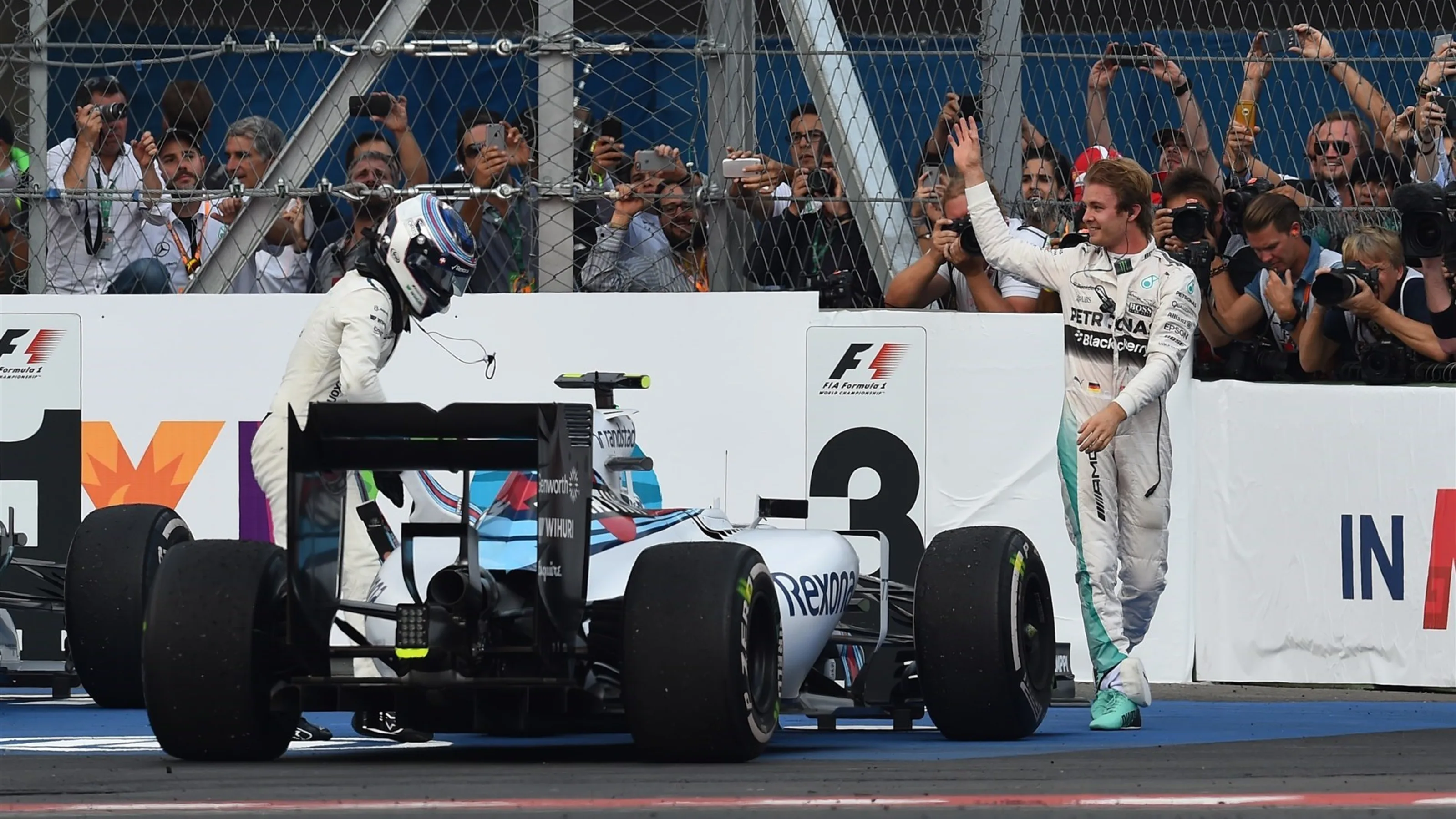Race winner Nico Rosberg (GER) Mercedes AMG F1 and Valtteri Bottas (FIN) Williams FW37 celebrate in