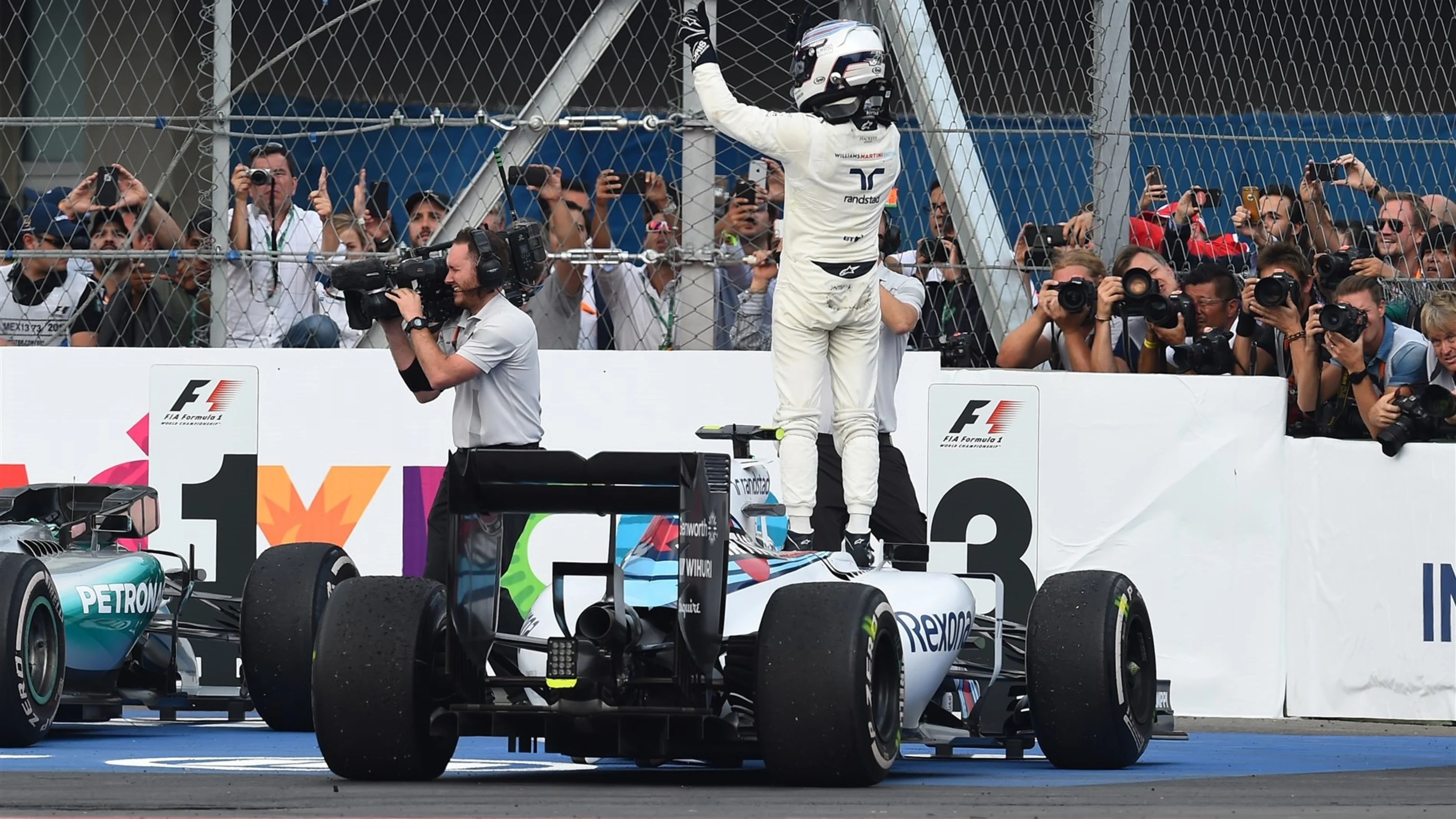 Valtteri Bottas (FIN) Williams FW37 celebrates in parc ferme at Formula One World Championship,