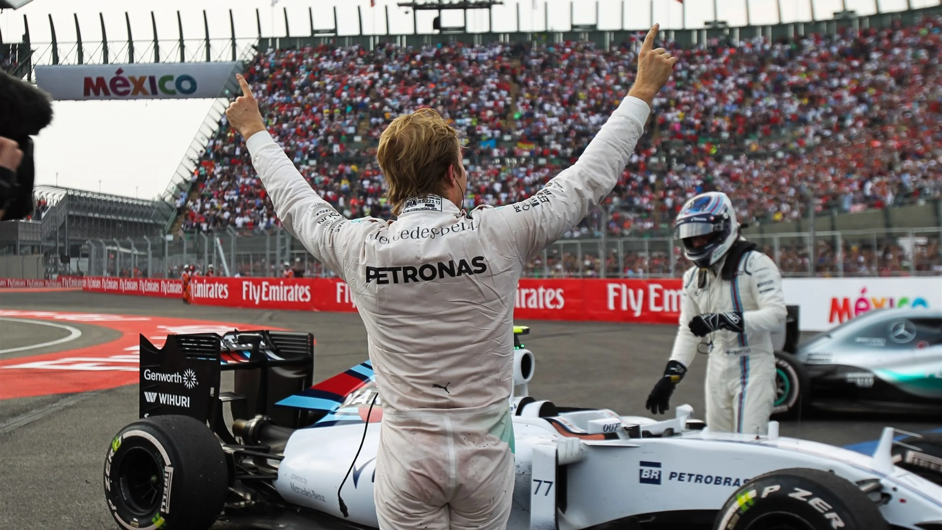 Race winner Nico Rosberg (GER) Mercedes AMG F1 and Valtteri Bottas (FIN) Williams FW37 celebrate in