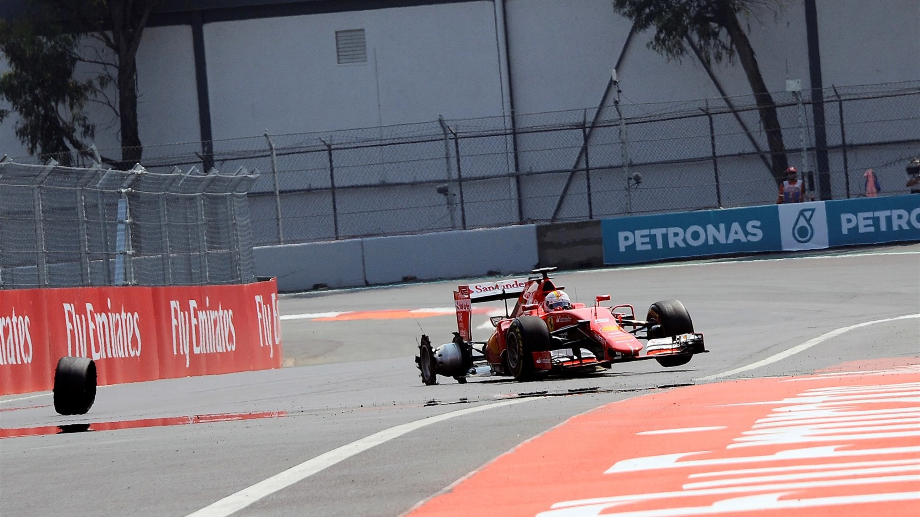 Sebastian Vettel (GER) Ferrari SF15-T with a puncture on lap one at Formula One World Championship,