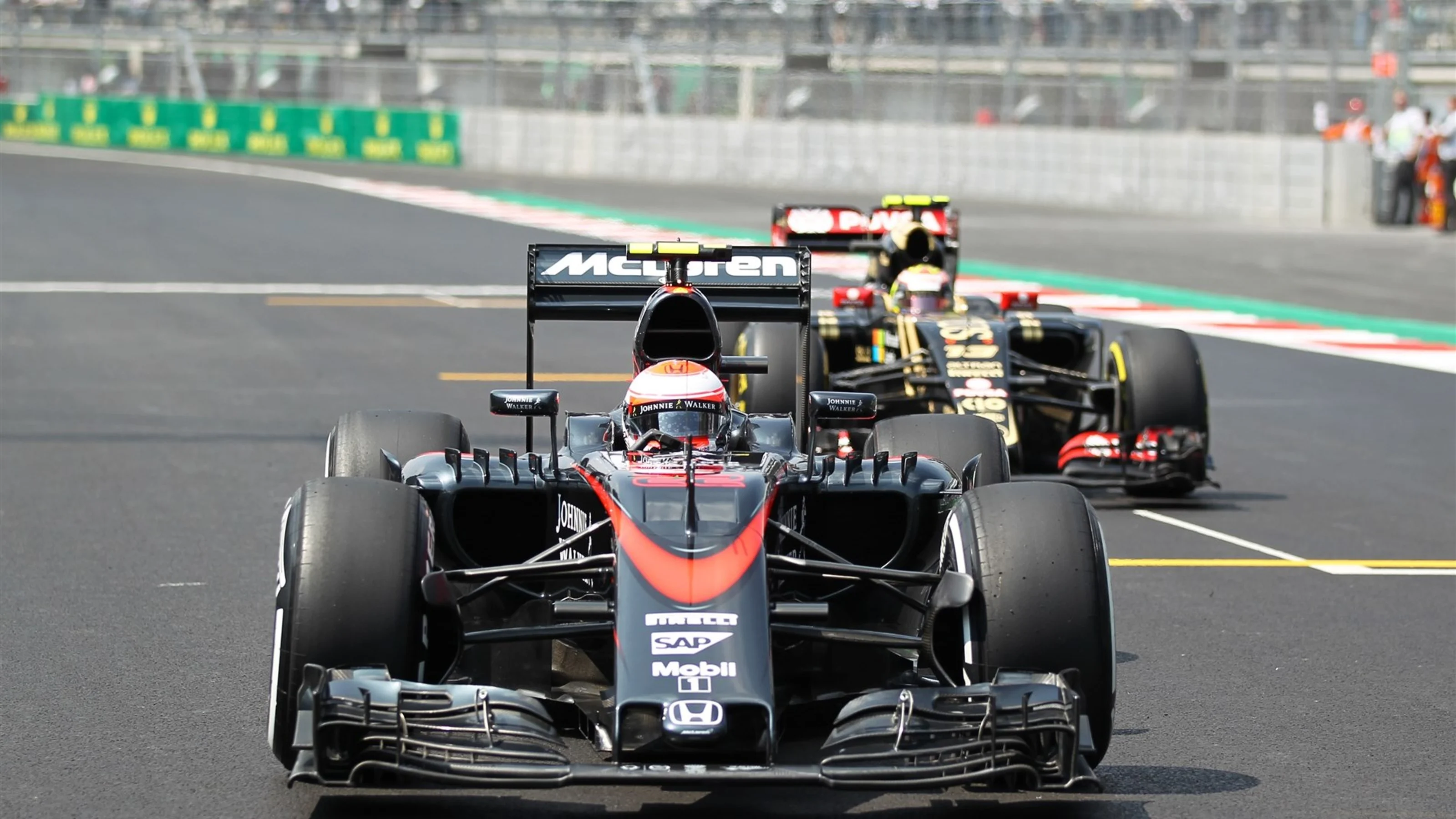 Jenson Button (GBR) McLaren MP4-30 on the grid at Formula One World Championship, Rd17, Mexican