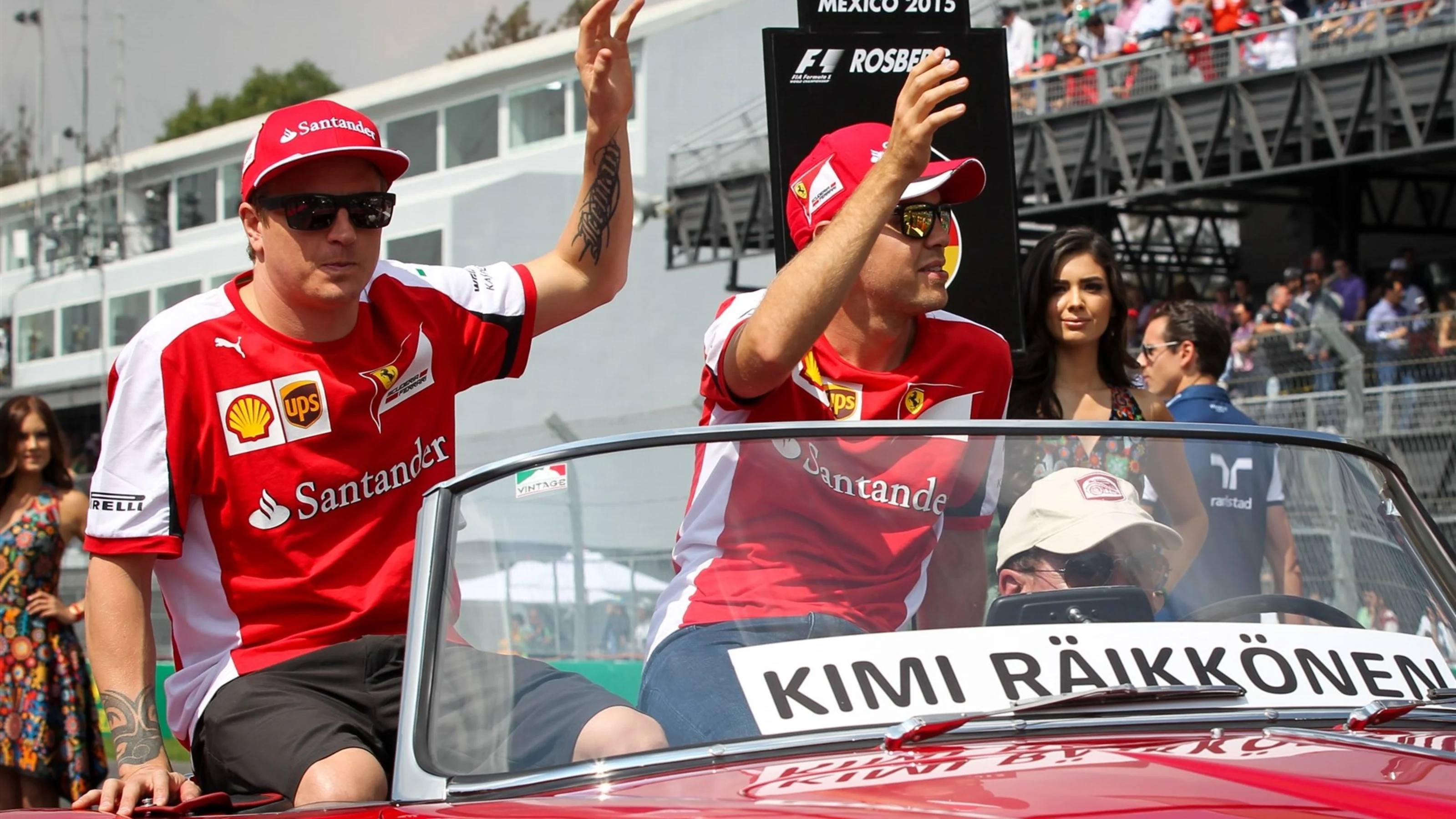 Kimi Raikkonen (FIN) Ferrari and Sebastian Vettel (GER) Ferrari at the drivers parade at Formula