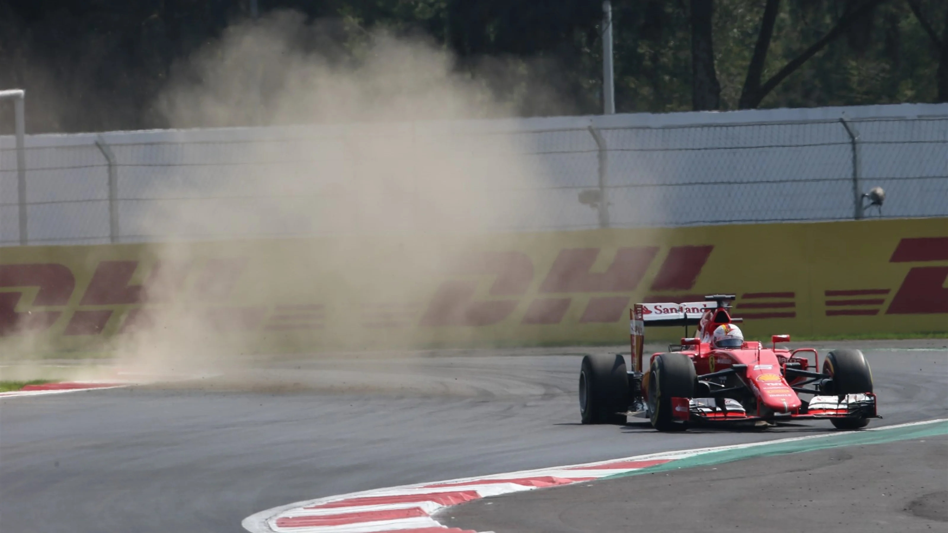 Sebastian Vettel (GER) Ferrari SF15-T with a puncture on lap one at Formula One World Championship,