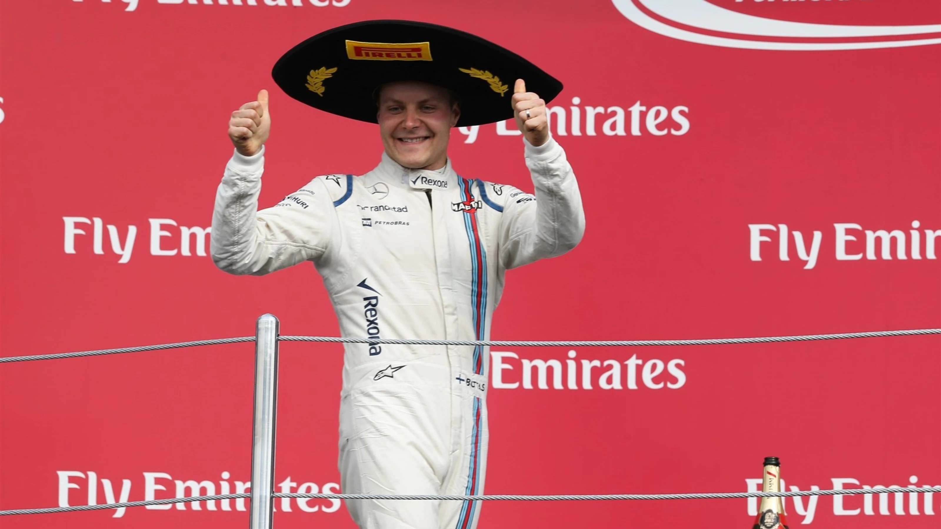 Valtteri Bottas (FIN) Williams celebrates on the podium at Formula One World Championship, Rd17,
