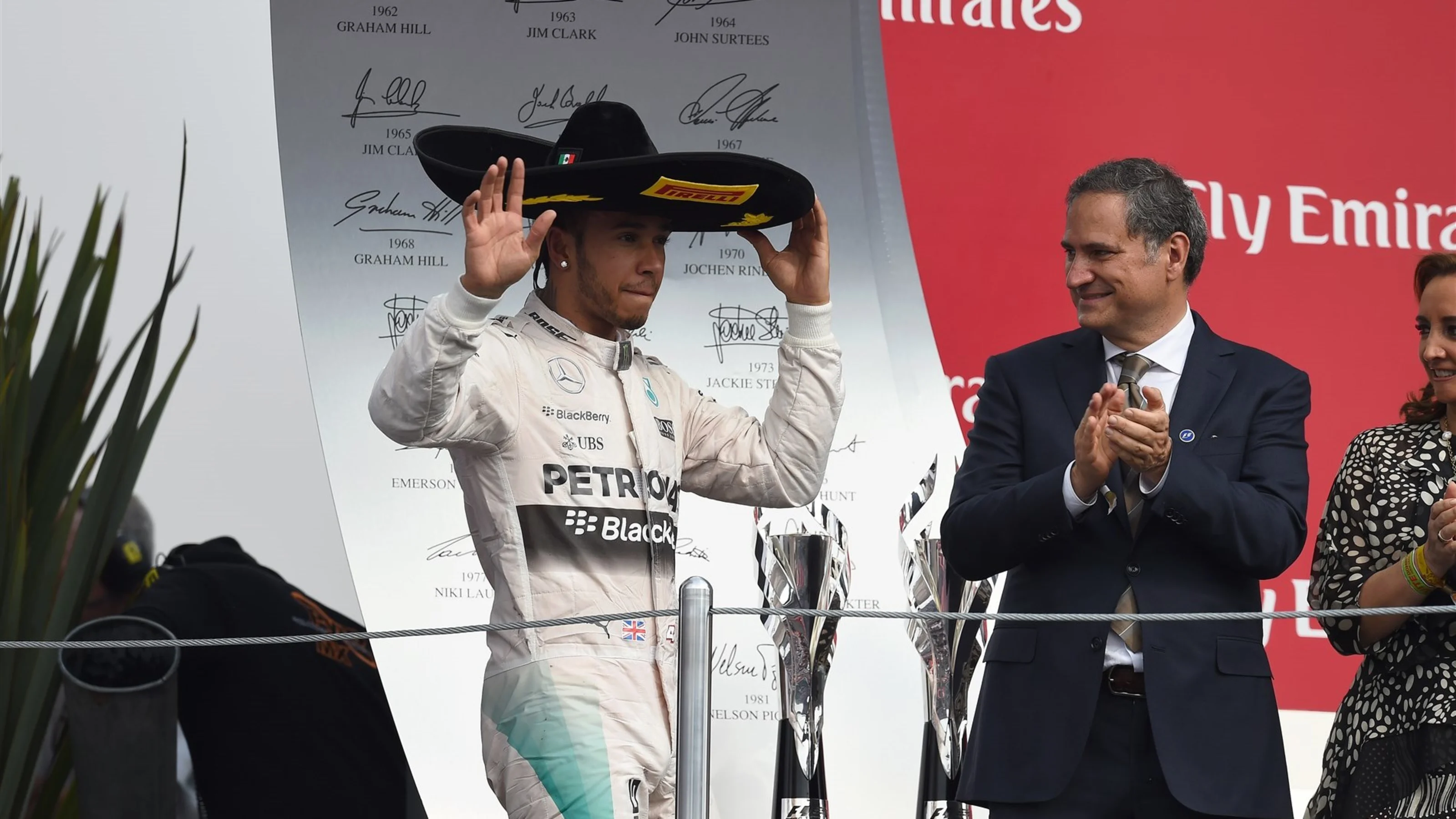 Lewis Hamilton (GBR) Mercedes AMG F1 celebrates on the podium at Formula One World Championship,