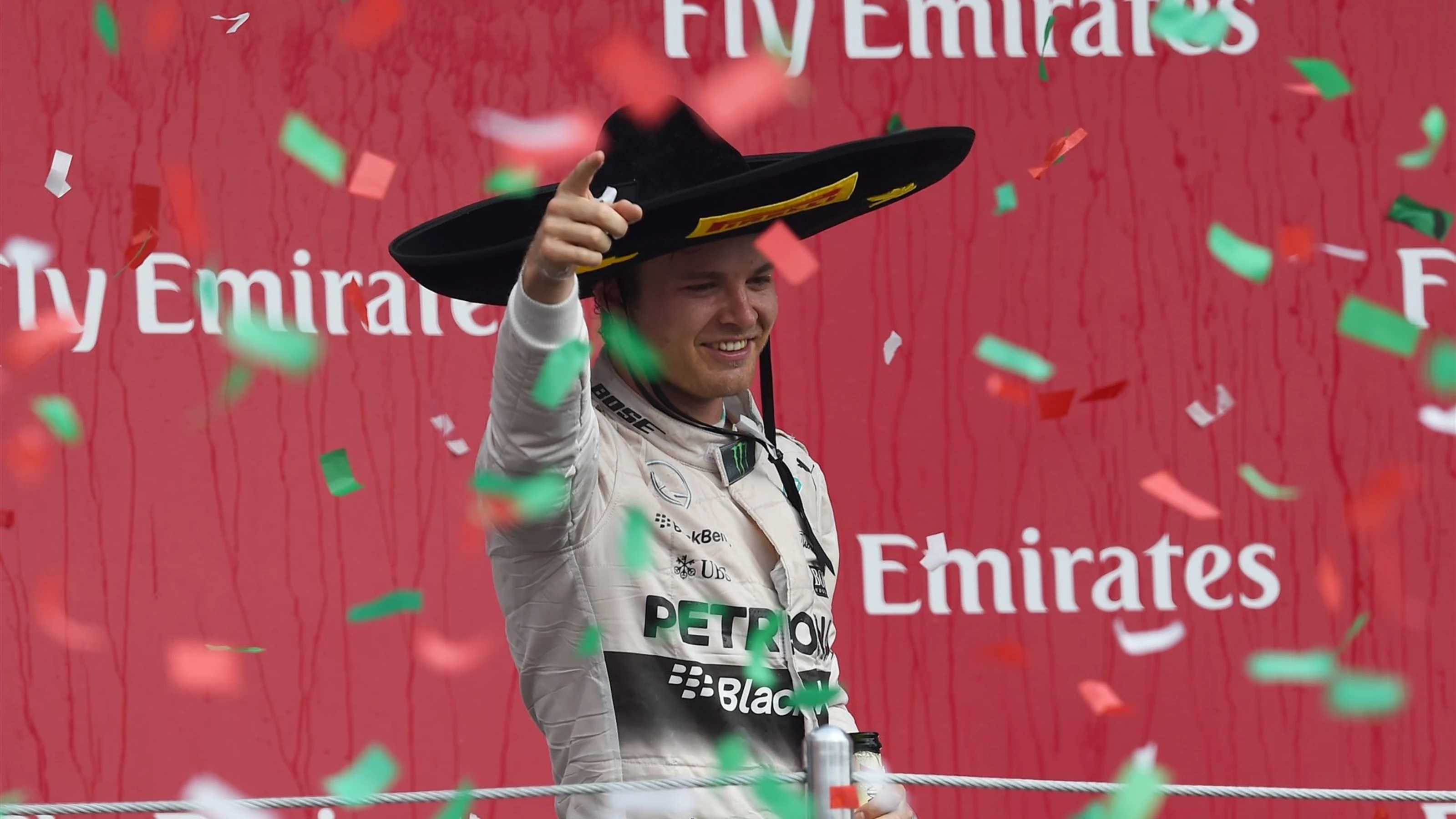 Race winner Nico Rosberg (GER) Mercedes AMG F1 celebrates on the podium with the champagne at