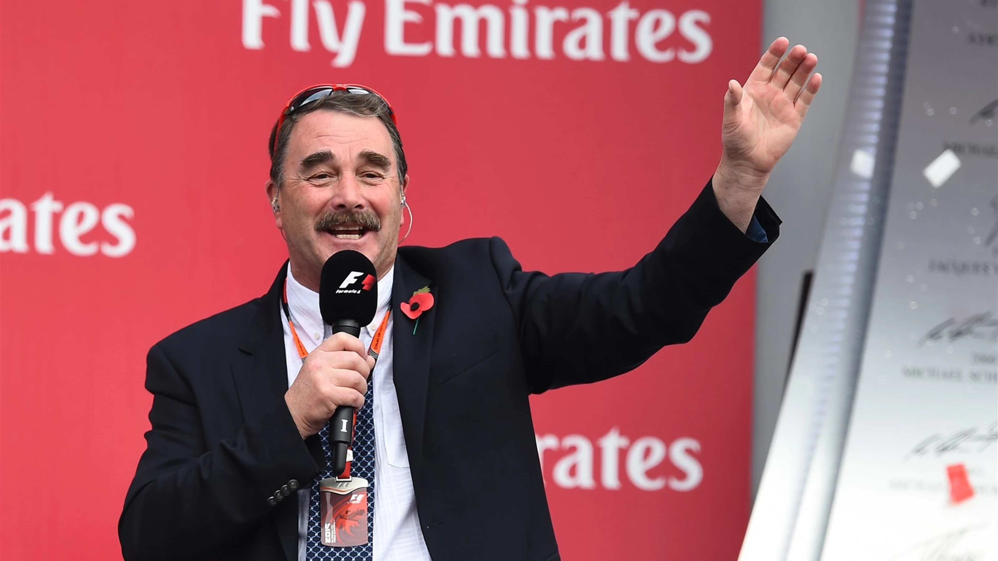 Nigel Mansell (GBR) on the podium at Formula One World Championship, Rd17, Mexican Grand Prix,