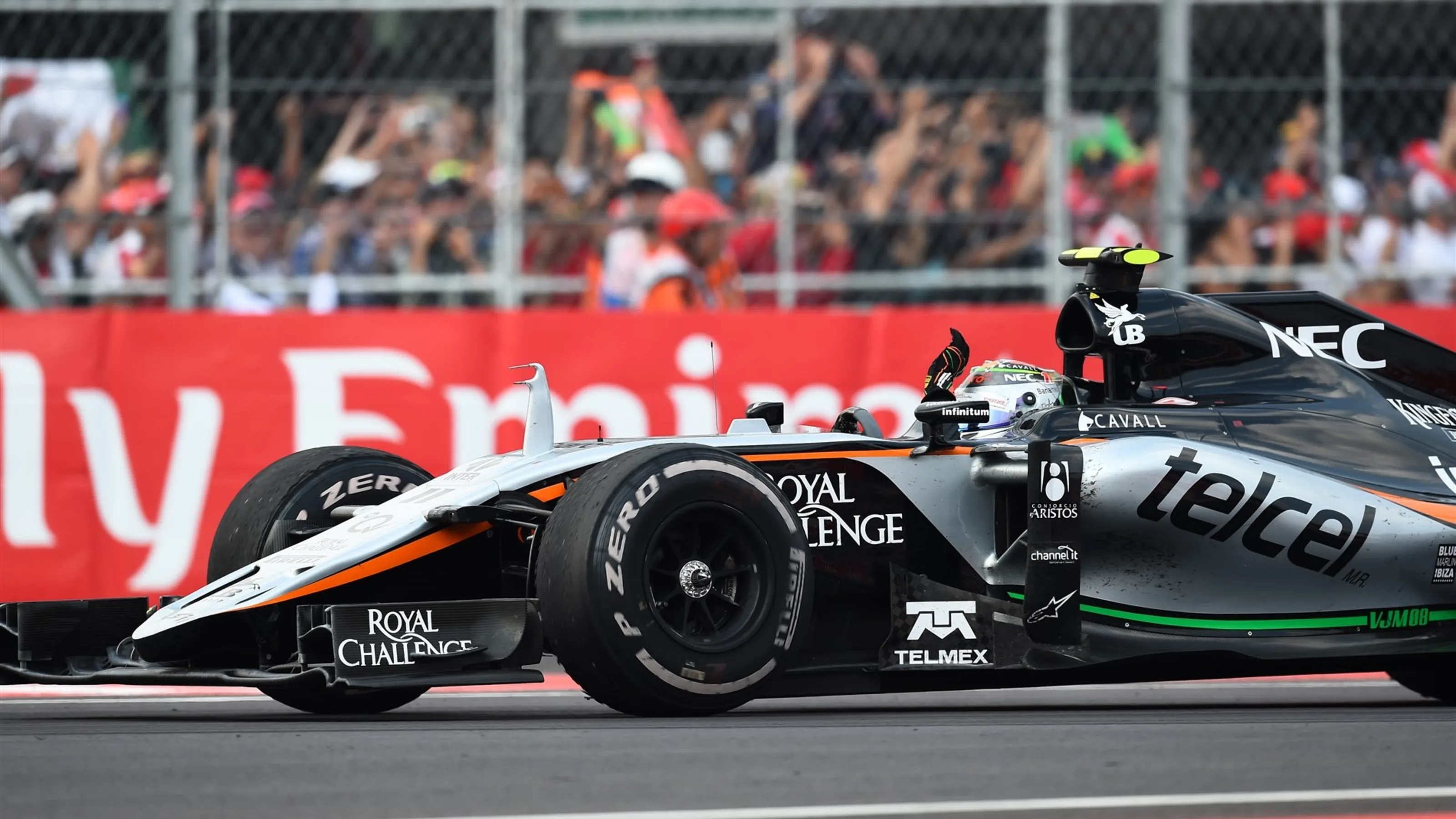Sergio Perez (MEX) Force India VJM08 celebrates at the end of the race at Formula One World