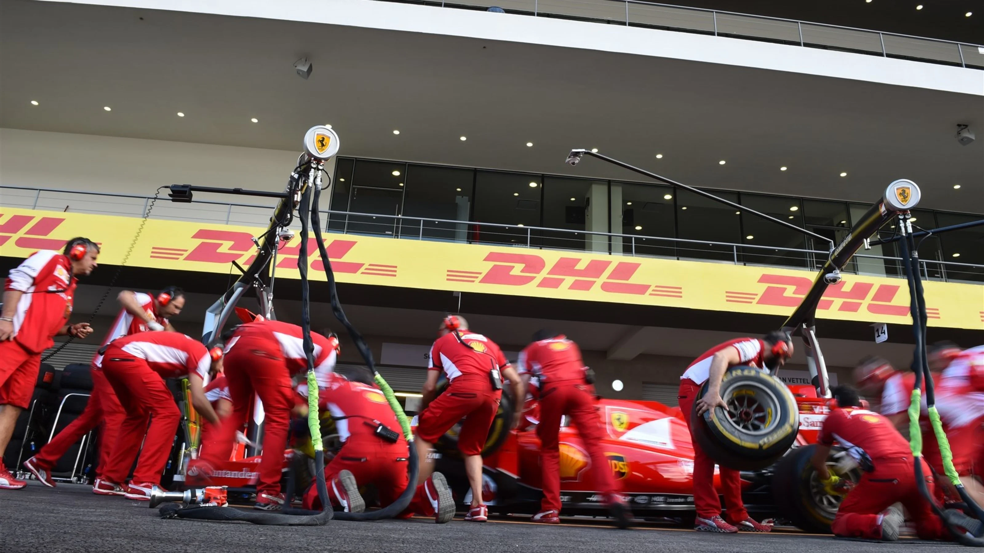 Ferrari pit stop practice at Formula One World Championship, Rd17, Mexican Grand Prix,