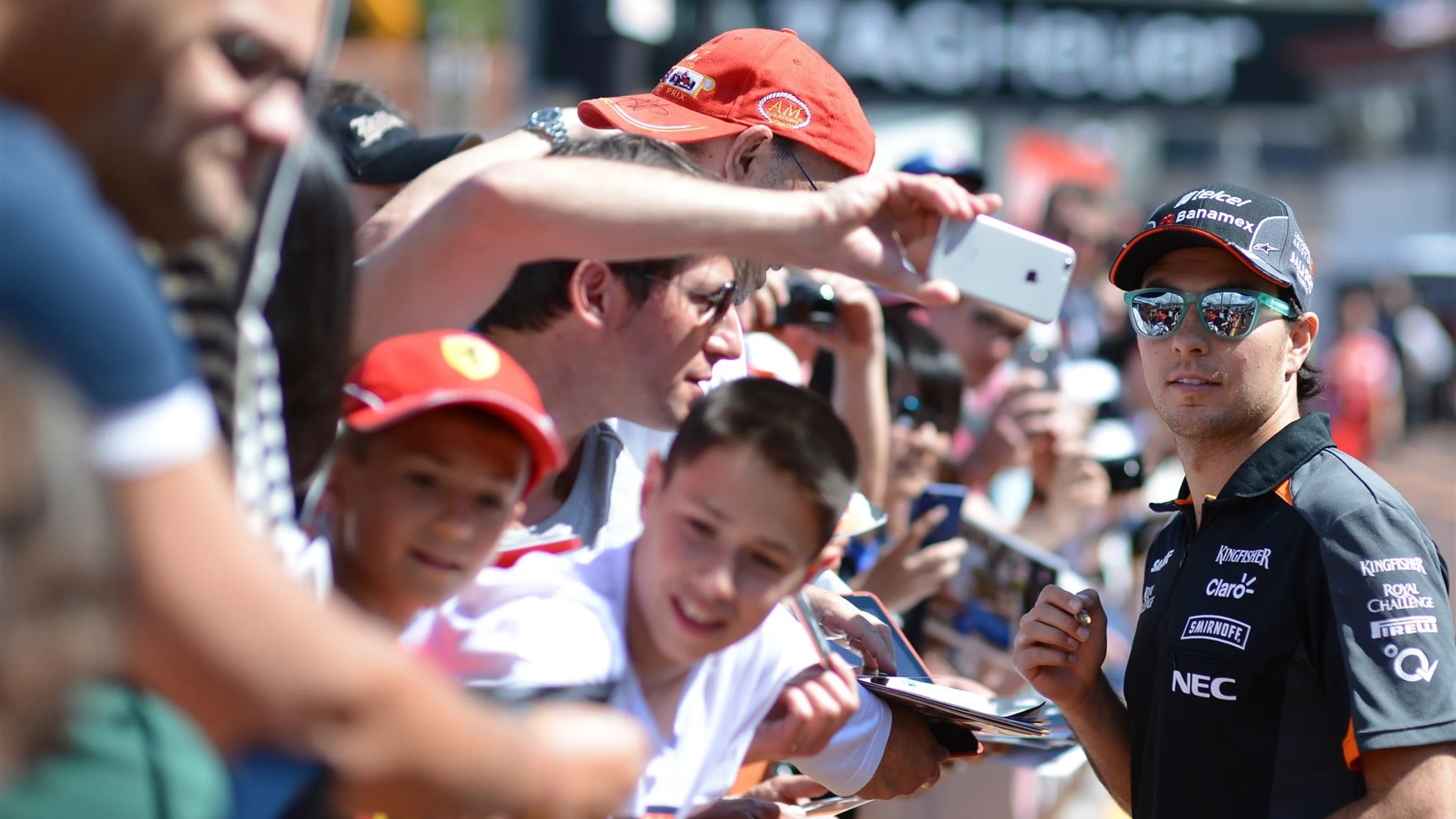 Sergio Perez (MEX) Force India poses for a selfie with the fans Formula One World Championship,