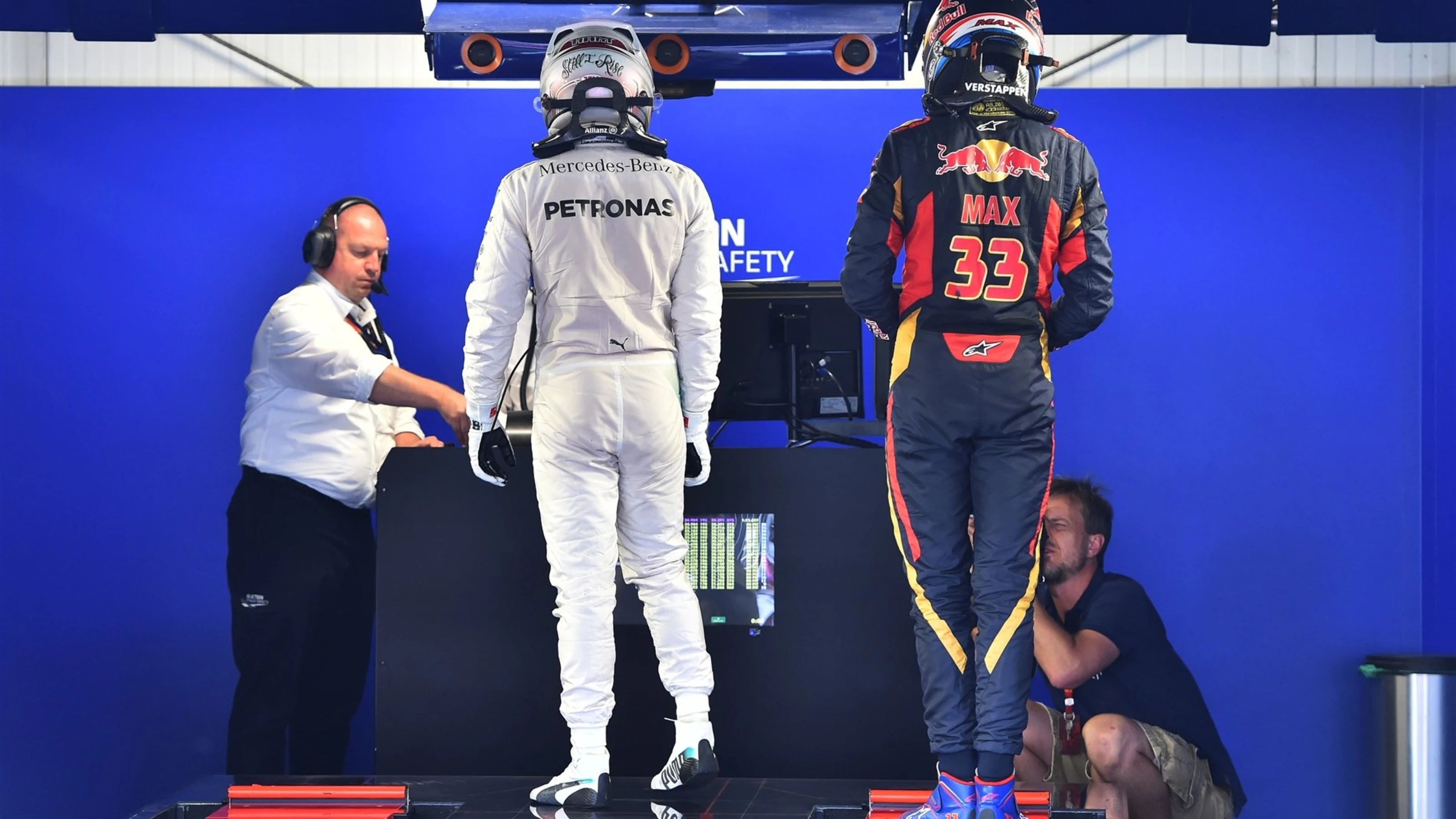 Lewis Hamilton (GBR) Mercedes AMG F1 and Max Verstappen (NDL) Scuderia Toro Rosso on the weighing