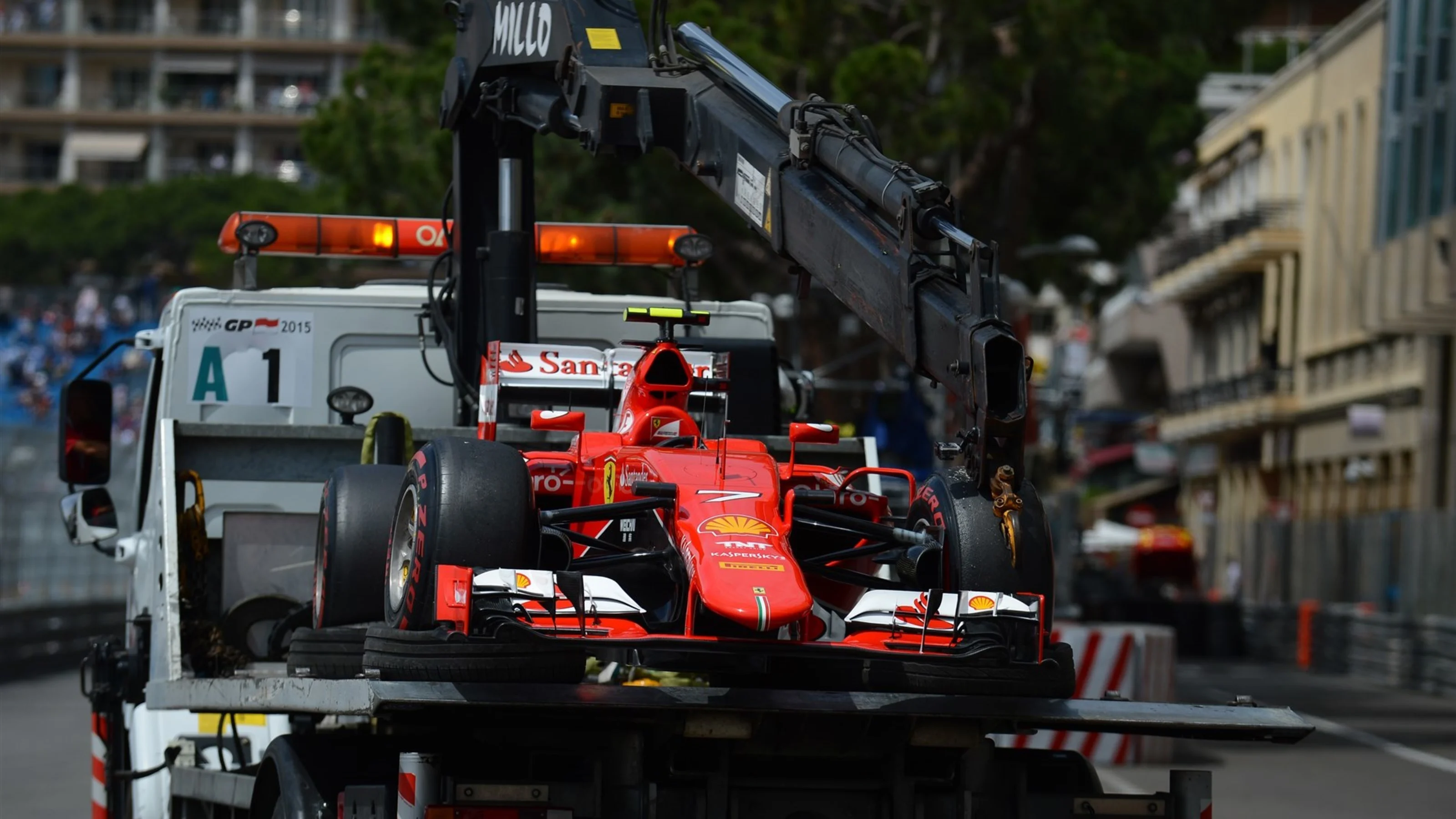 The car of Kimi Raikkonen (FIN) Ferrari SF15-T is recovered at Formula One World Championship, Rd6,