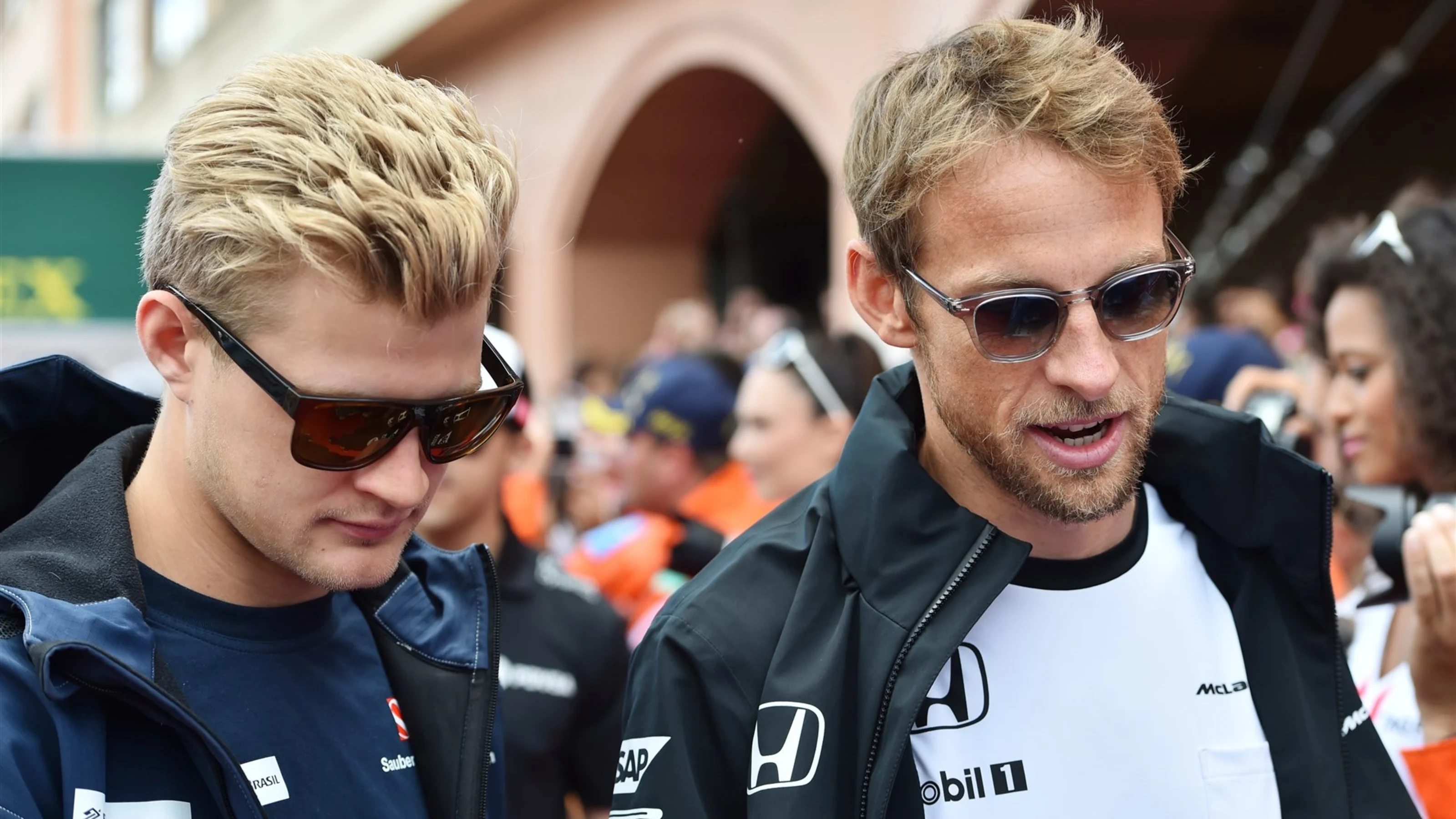 Marcus Ericsson (SWE) Sauber and Jenson Button (GBR) McLaren on the drivers parade at Formula One