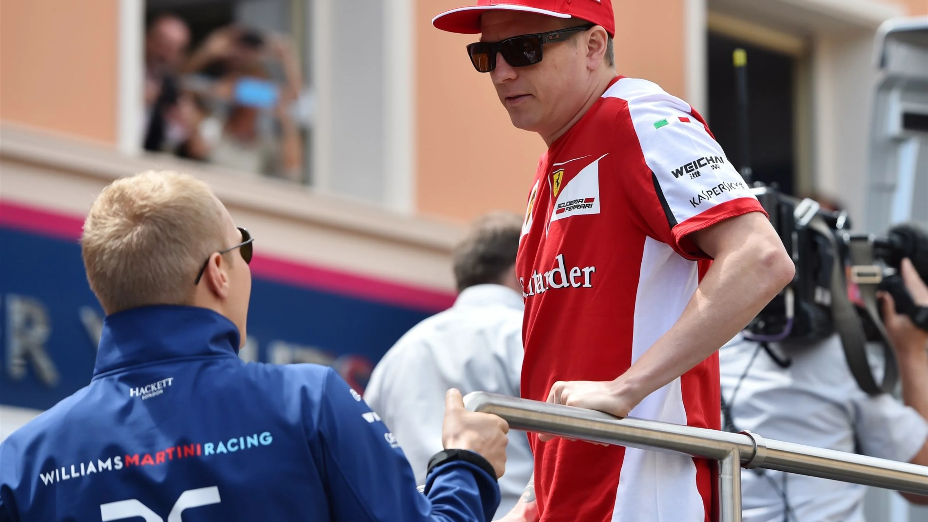 Valtteri Bottas (FIN) Williams and Kimi Raikkonen (FIN) Ferrari on the drivers parade at Formula
