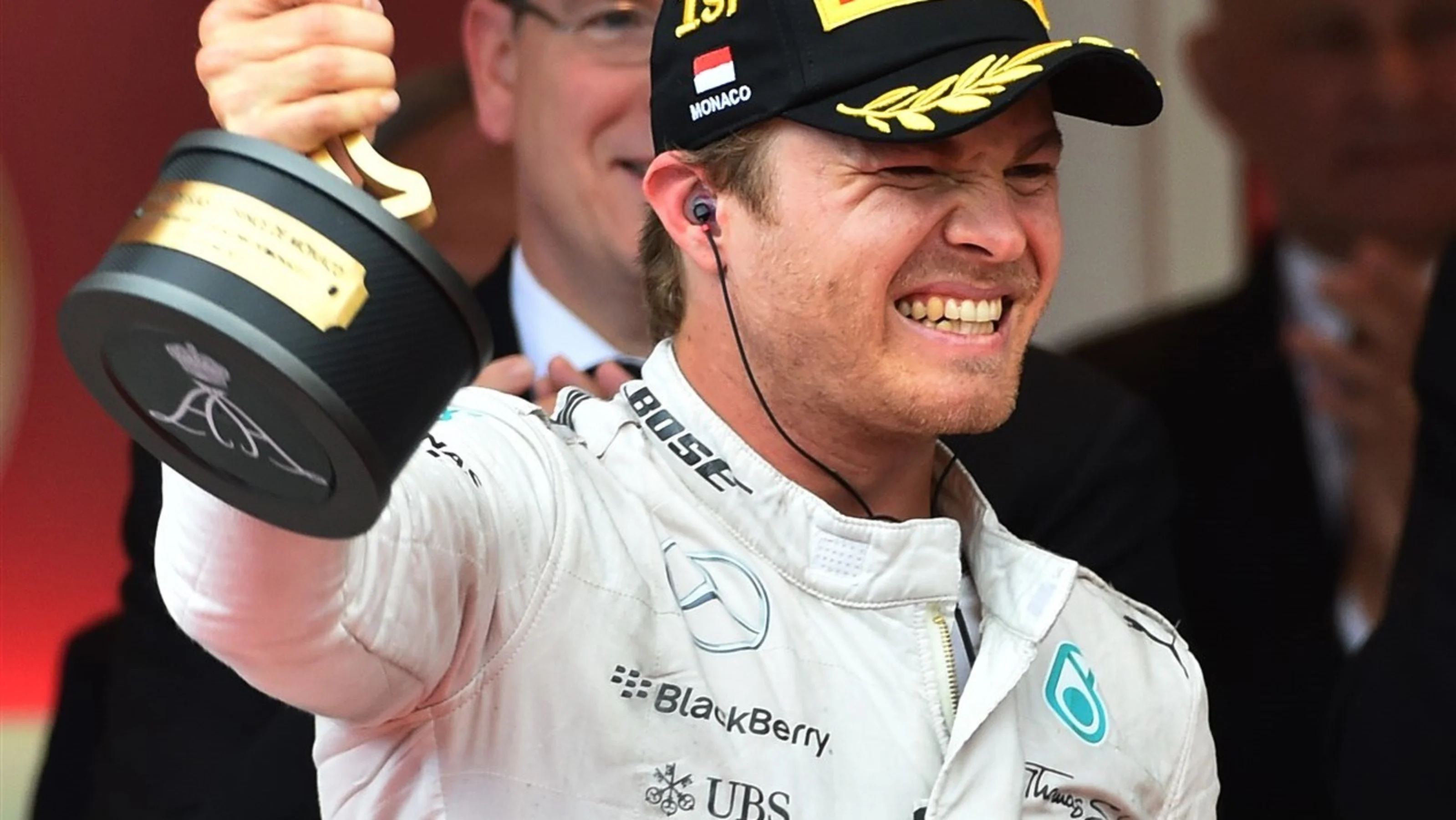Race winner Nico Rosberg (GER) Mercedes AMG F1 celebrates on the podium with the trophy at Formula