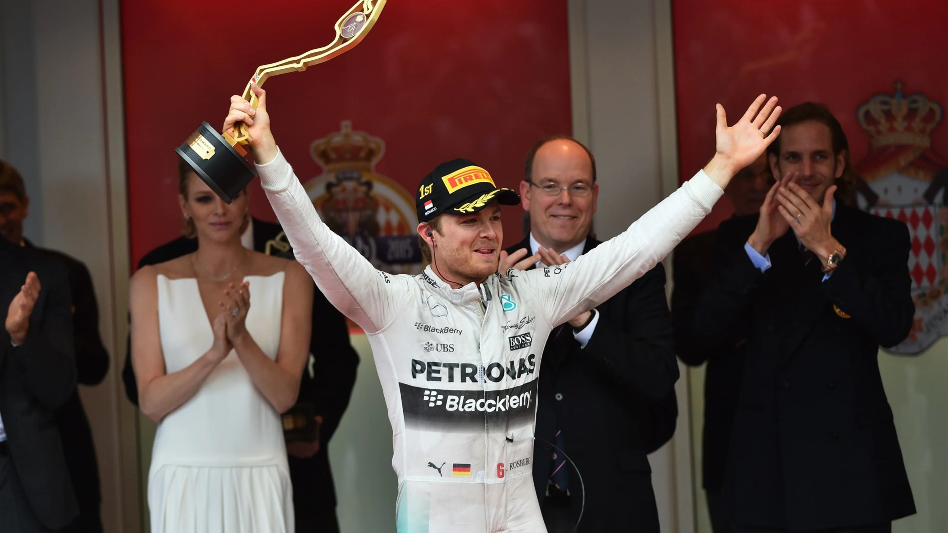 Race winner Nico Rosberg (GER) Mercedes AMG F1 celebrates on the podium with the trophy at Formula
