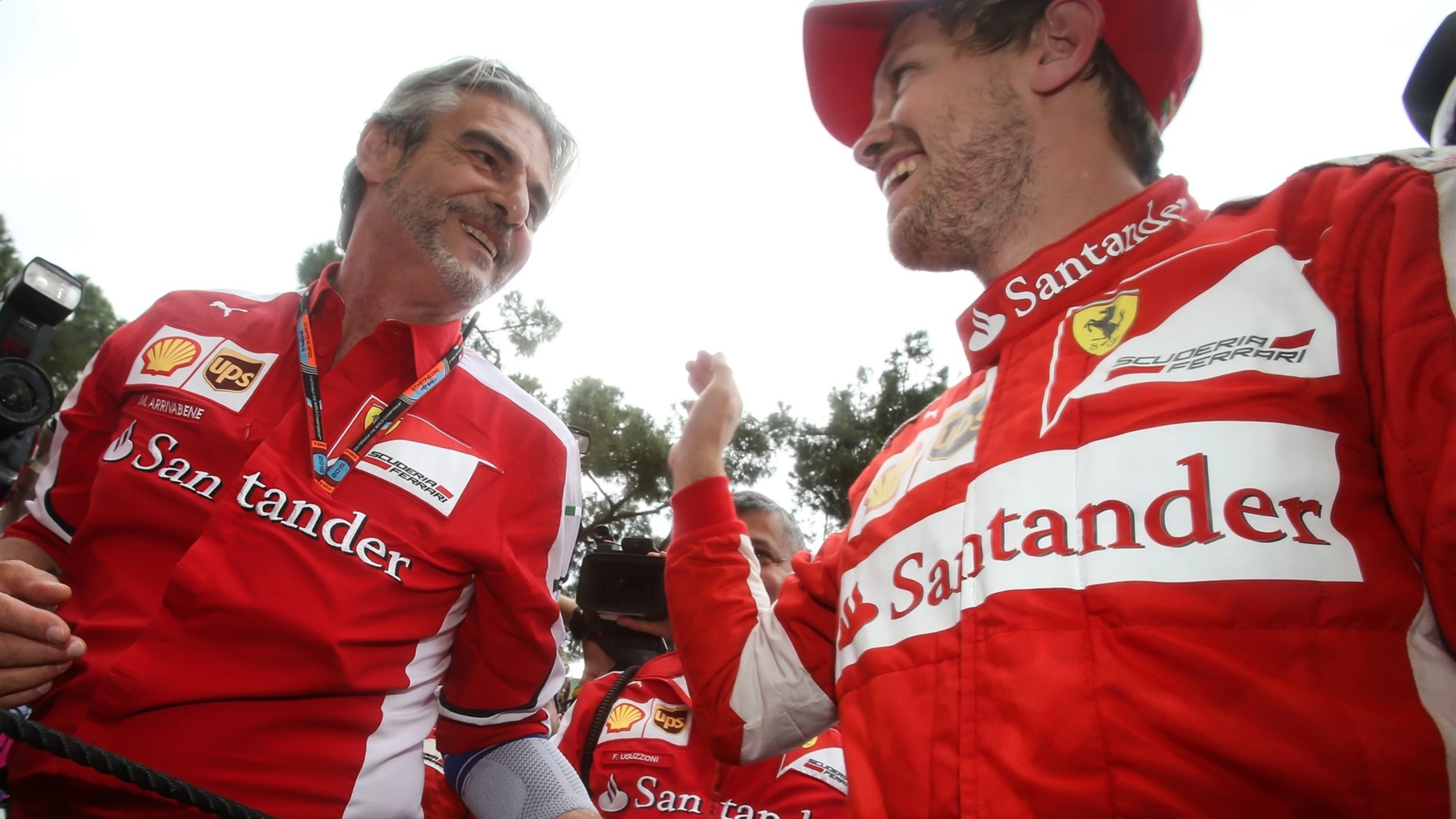Second placed Sebastian Vettel (GER) Ferrari and Maurizio Arrivabene (ITA) Ferrari Team Principal