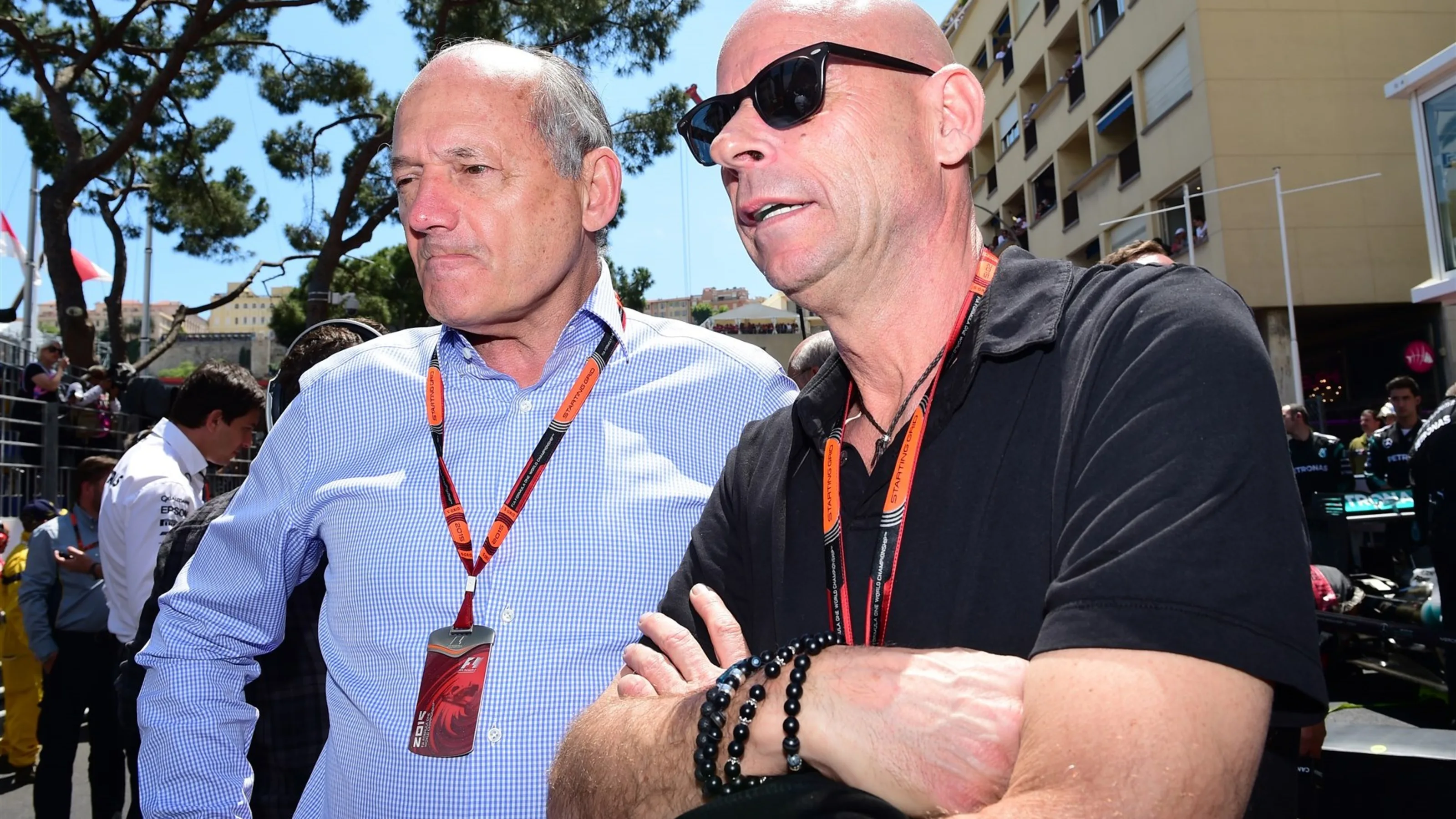 Ron Dennis (GBR) McLaren Executive Chairman and Guy Liberte (CDN) Cirque de Soleil on the grid at