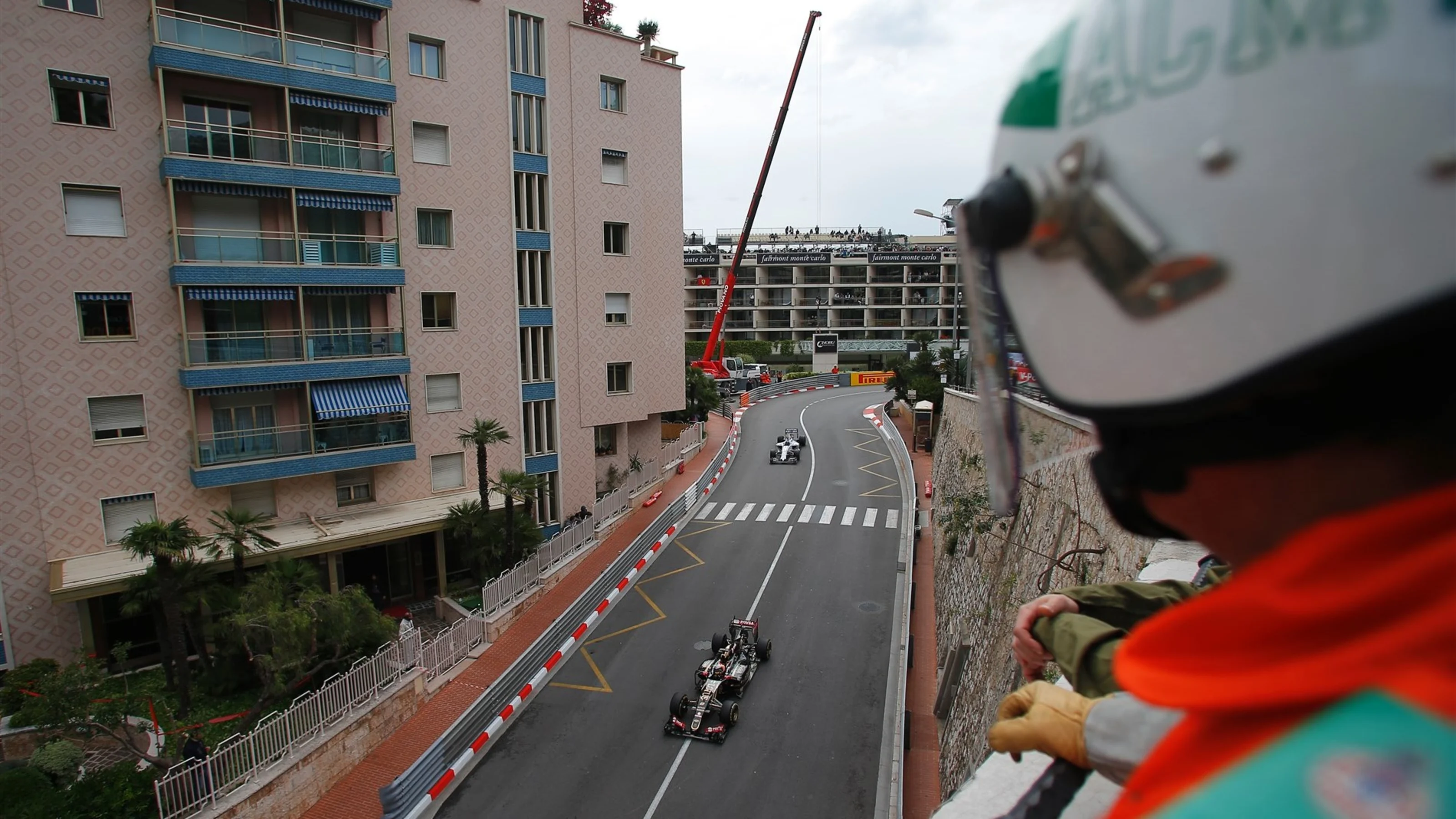 Marshal watches Romain Grosjean (FRA) Lotus E23 Hybrid at Formula One World Championship, Rd6,
