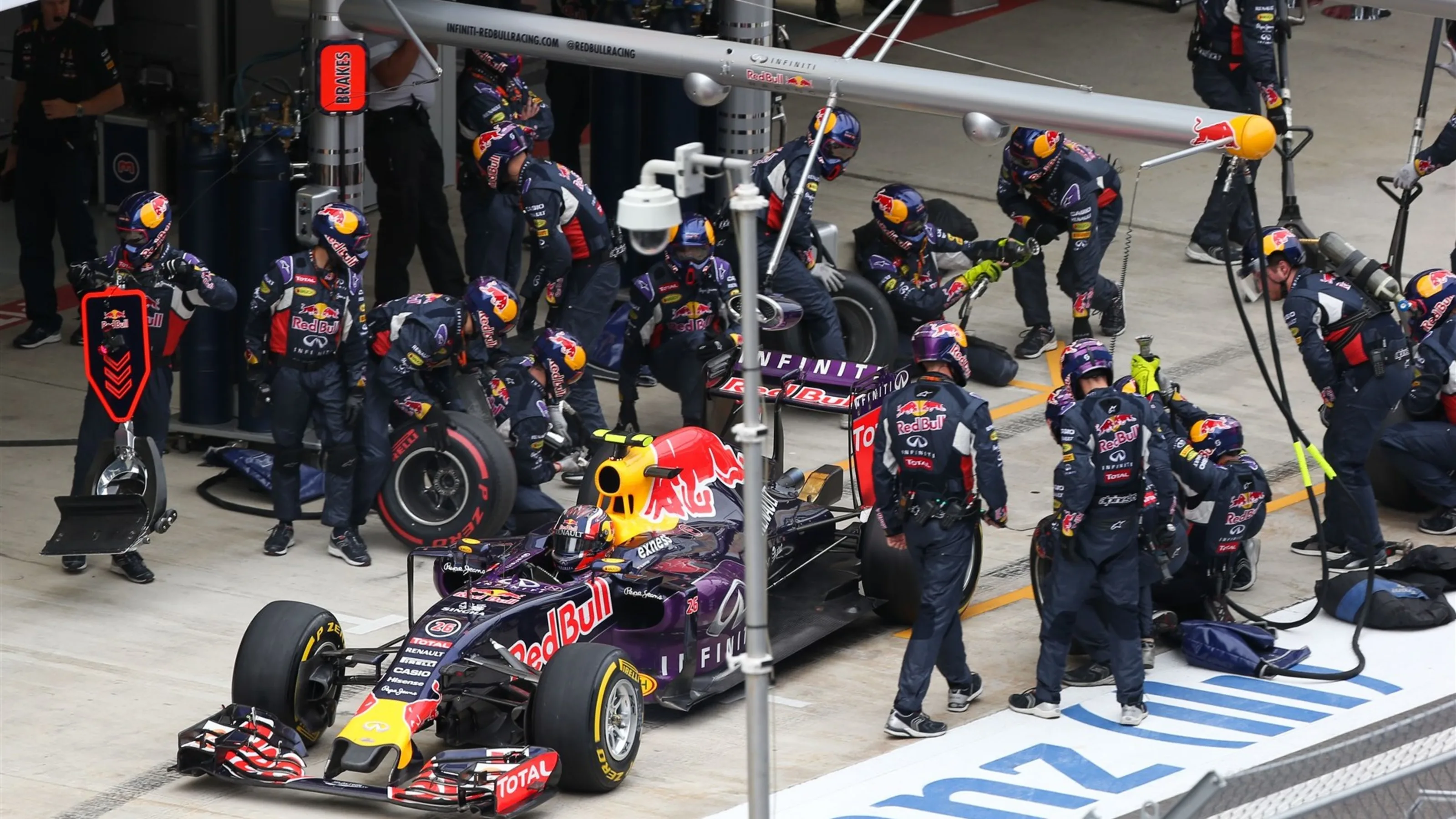 Pit Stop for Daniil Kvyat (RUS) Red Bull Racing RB11 at Formula One World Championship, Rd15,