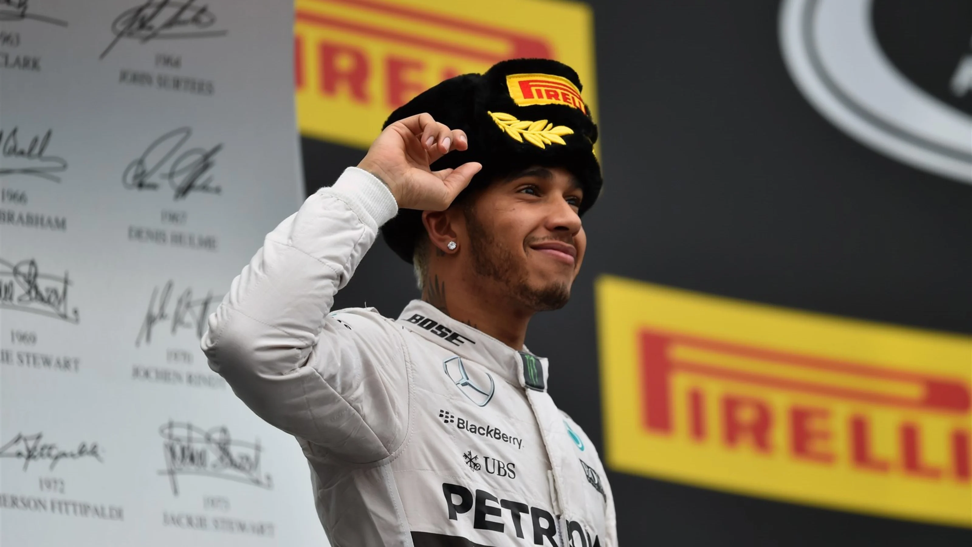 Race winner Lewis Hamilton (GBR) Mercedes AMG F1 celebrates on the podium at Formula One World