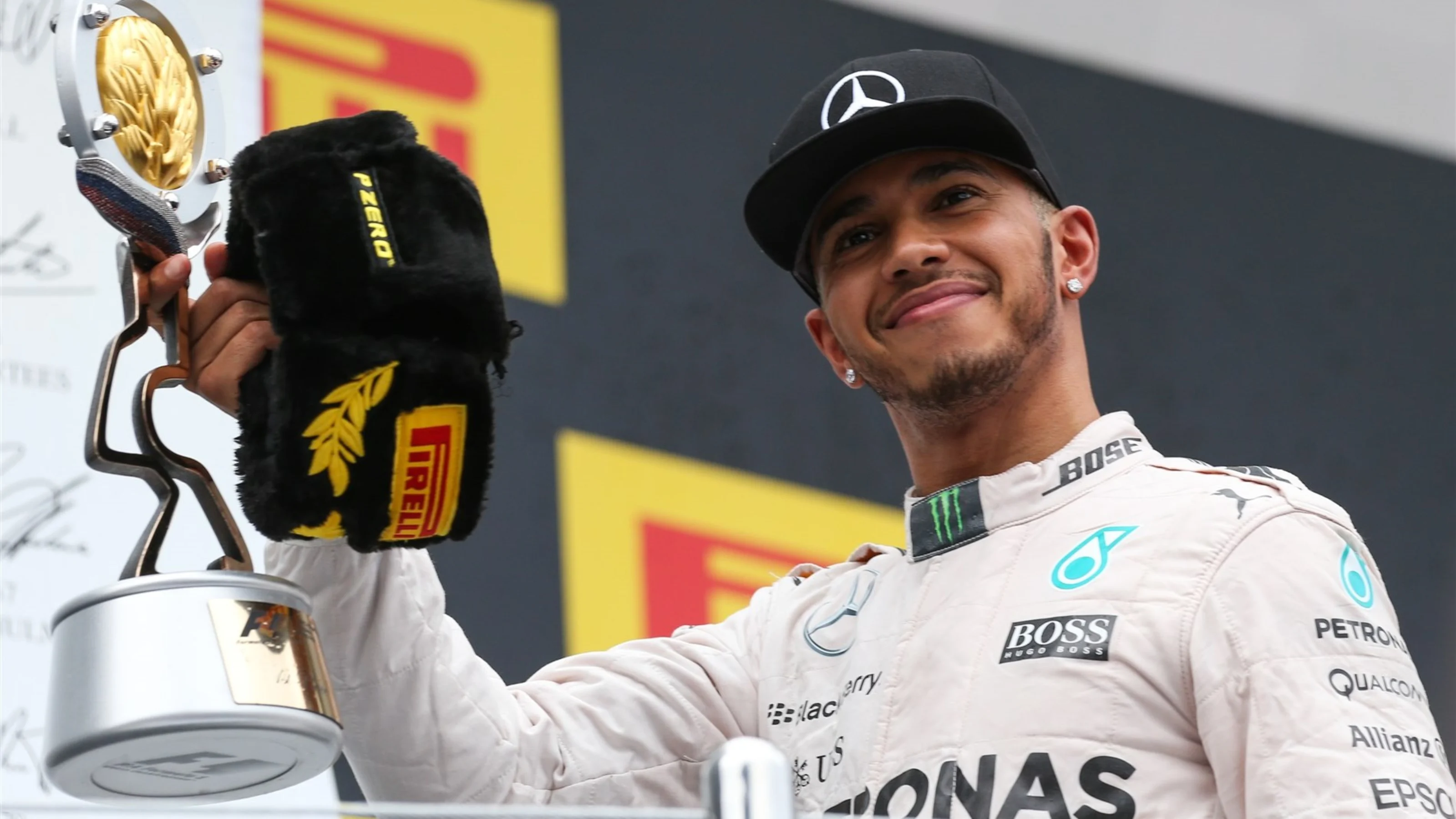 Race winner Lewis Hamilton (GBR) Mercedes AMG F1 celebrates with the trophy on the podium at