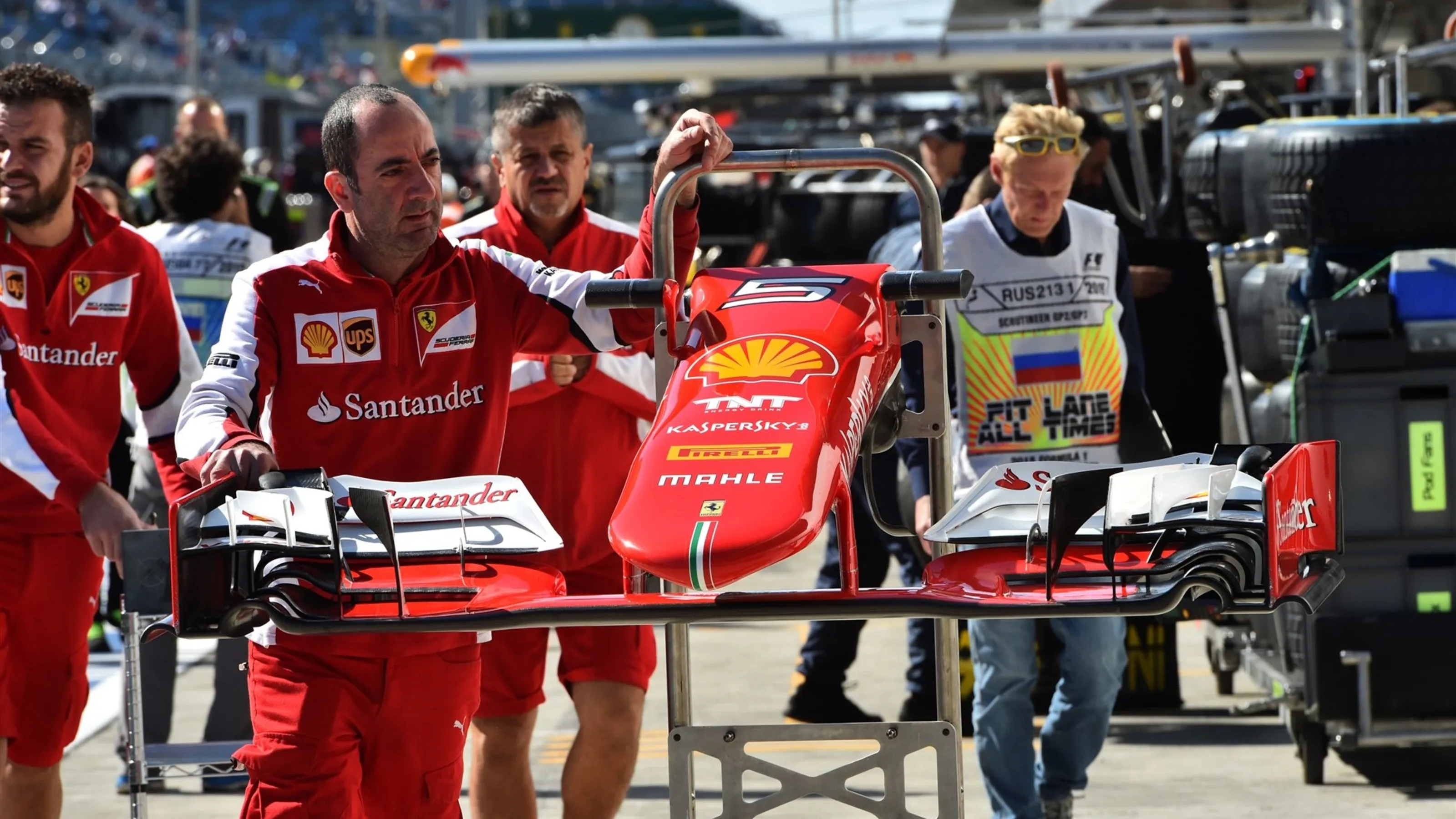 Ferrari mechanics with Ferrari SF15-T front wing at Formula One World Championship, Rd15, Russian