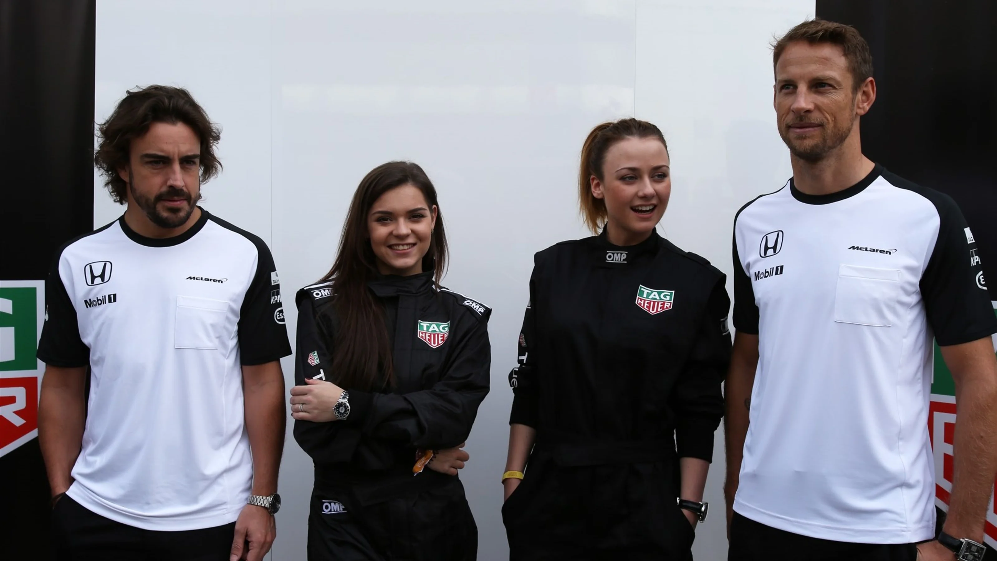 Fernando Alonso (ESP) McLaren and Jenson Button (GBR) McLaren with Ingrid Olerinskaya (RUS) Actress