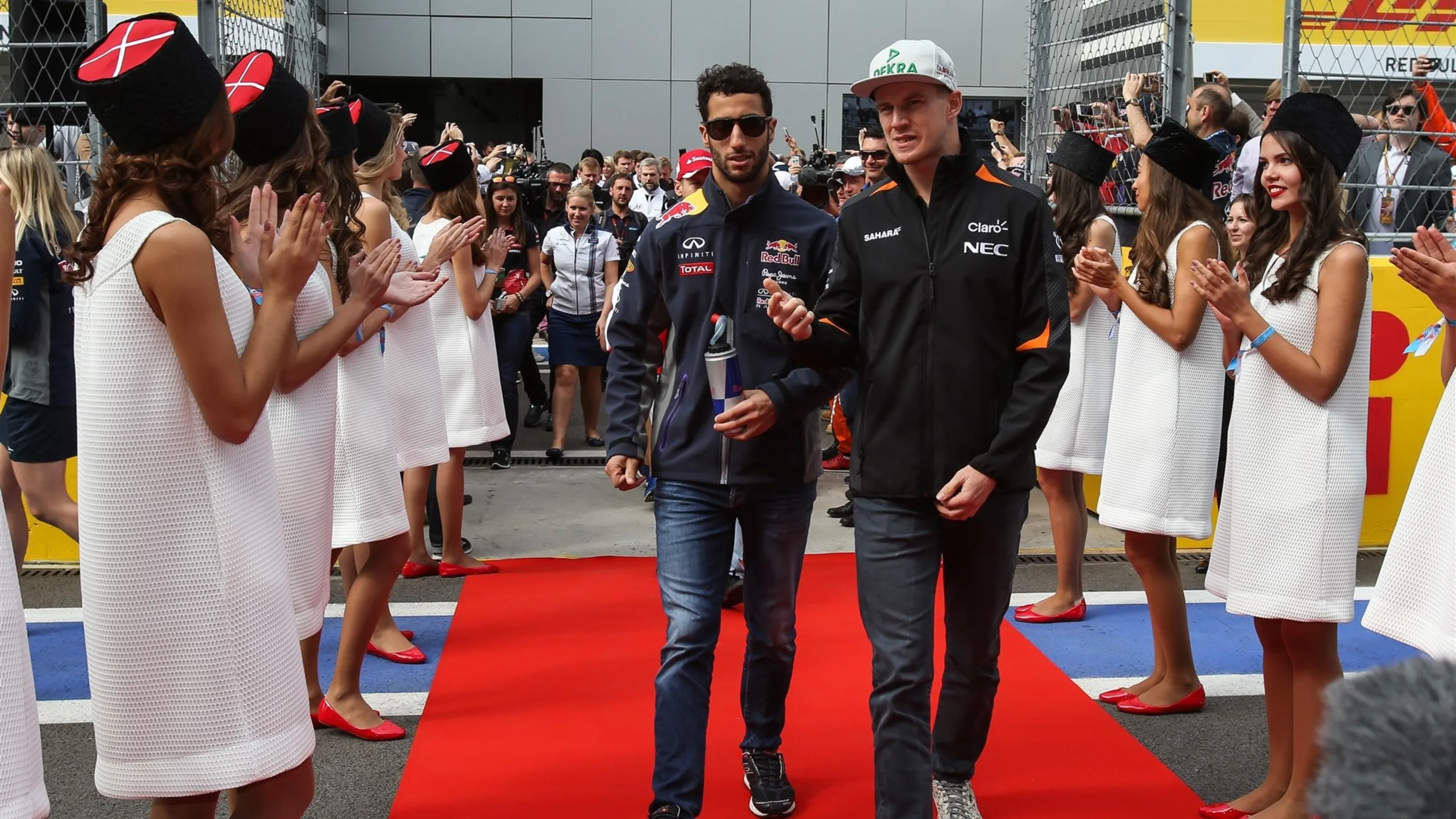 Daniel Ricciardo (AUS) Red Bull Racing and Nico Hulkenberg (GER) Force India F1 at the drivers