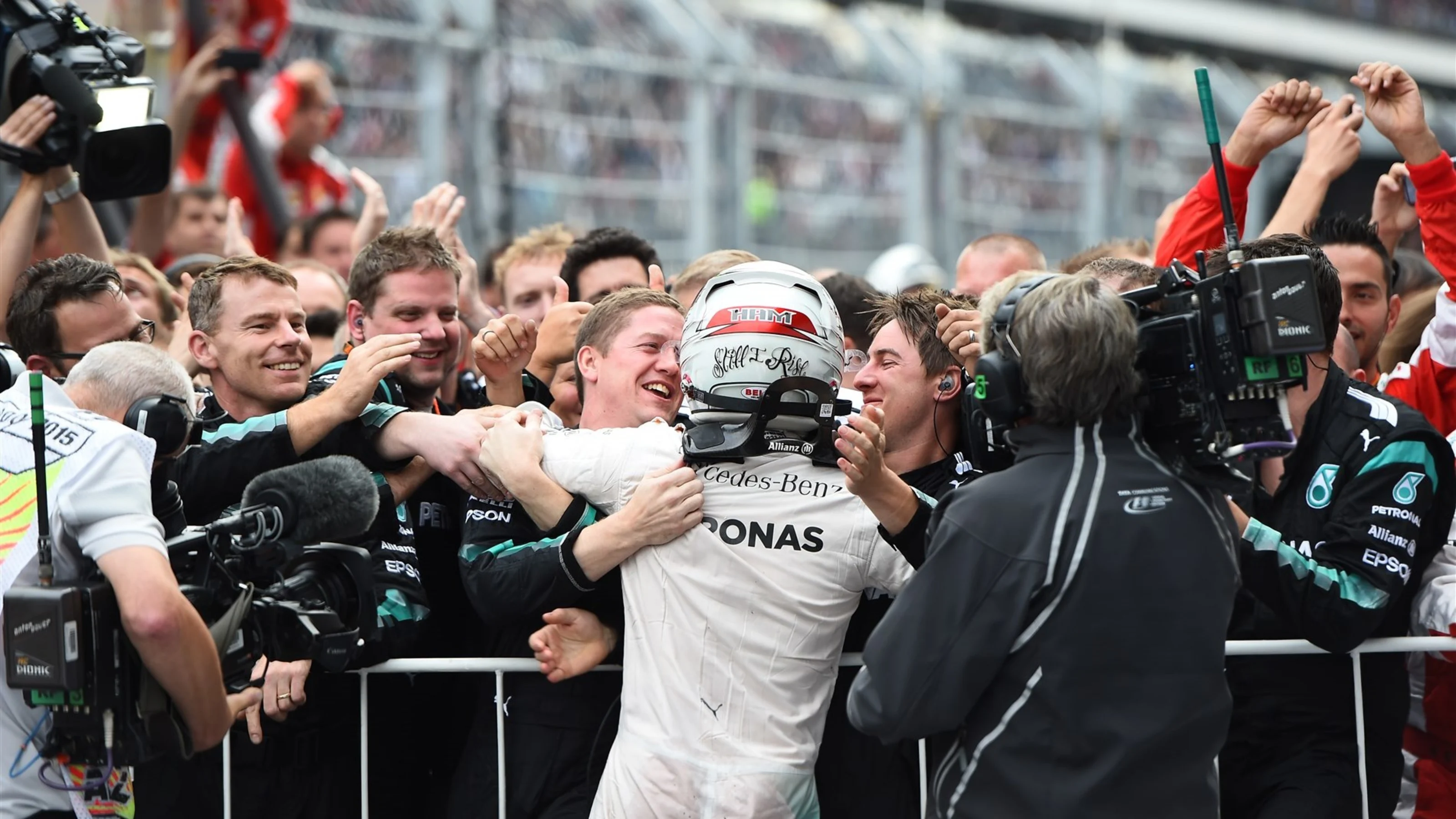 Lewis Hamilton (GBR) Mercedes AMG F1 W06 celebrates in parc ferme at Formula One World
