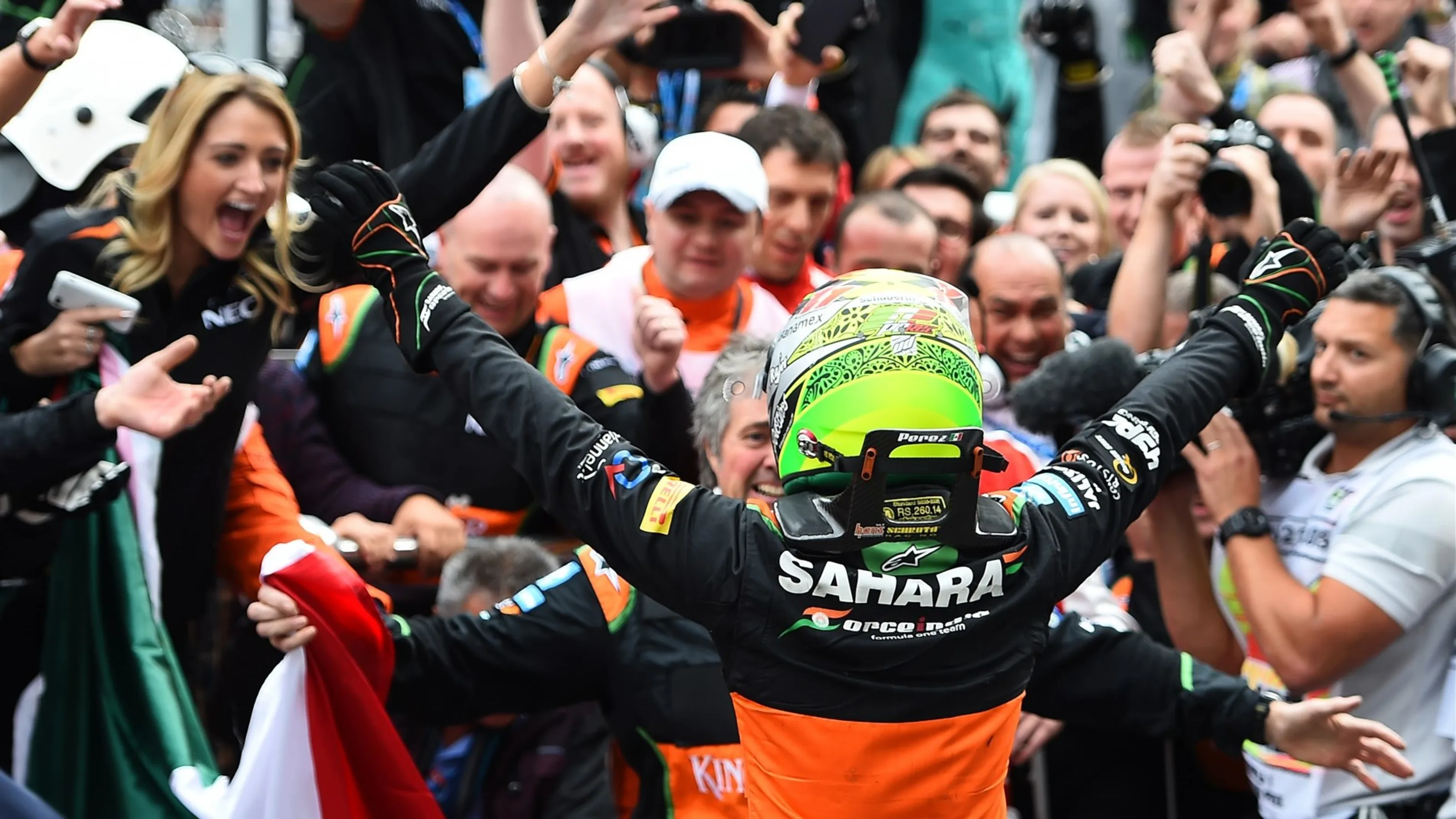 Sergio Perez (MEX) Force India celebrates in parc ferme at Formula One World Championship, Rd15,